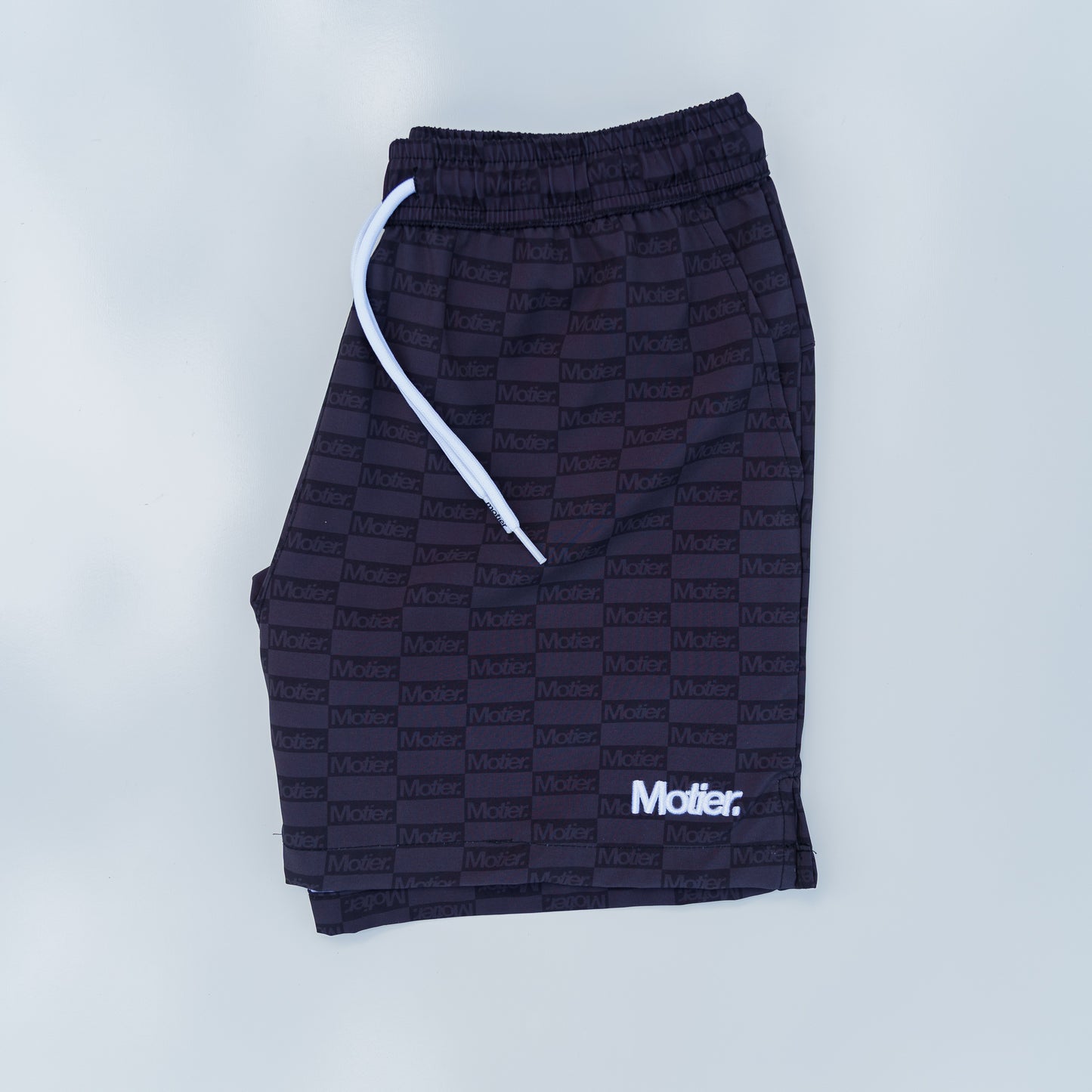 The STC Lineage Boardshorts (Black Checkered)