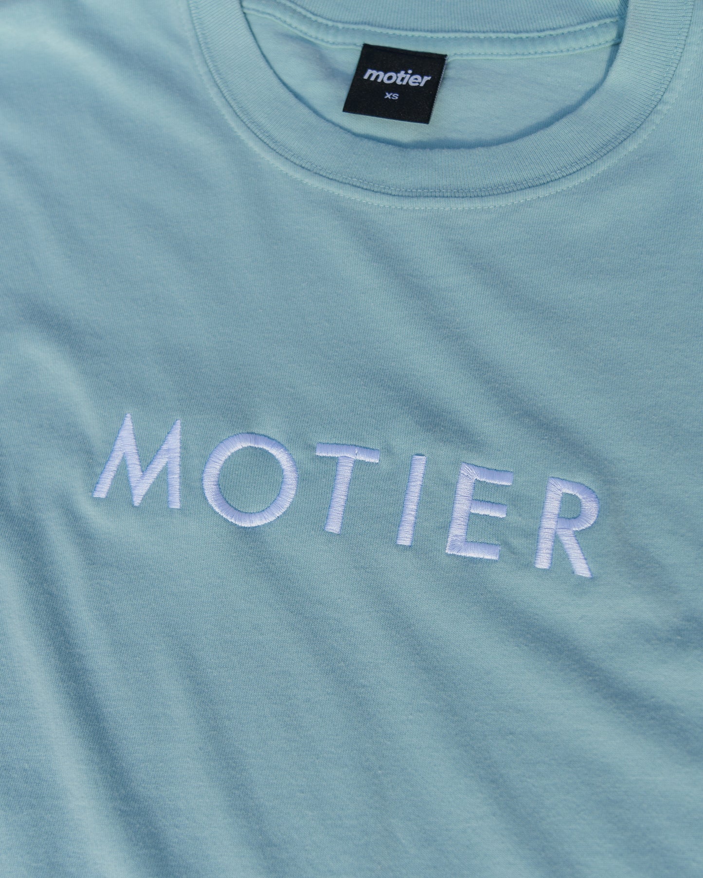 The Spaced Logo Embroidery Luxe Tee (Sterling Blue)