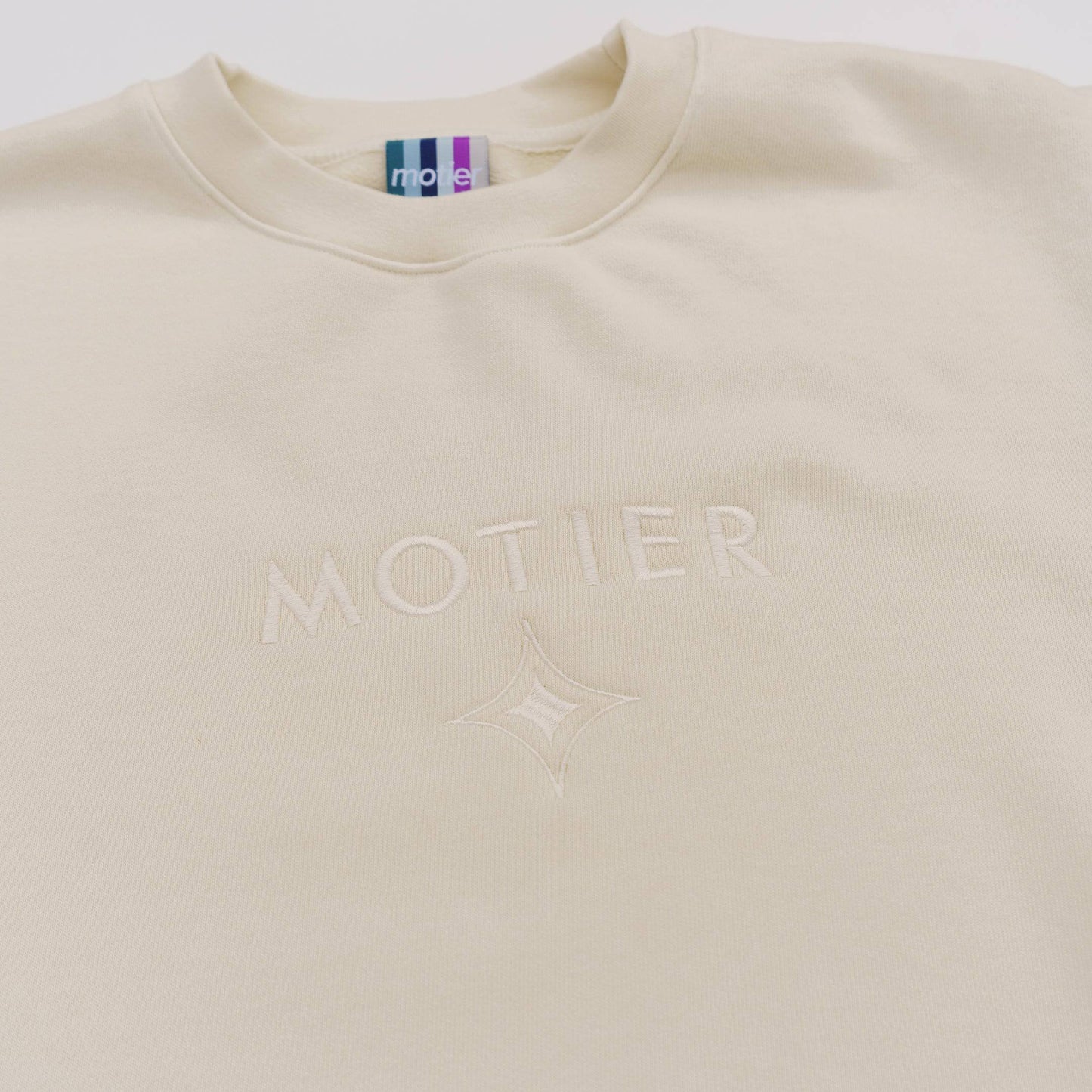 The Motier Astroid Embroidery Luxe Crewneck (White Sand)