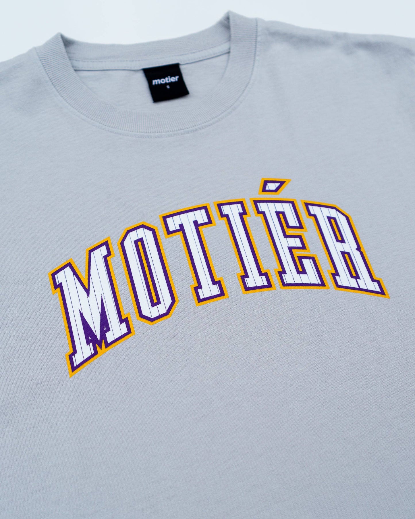 The Pinstripe University Luxe Tee (Lt. Grey)