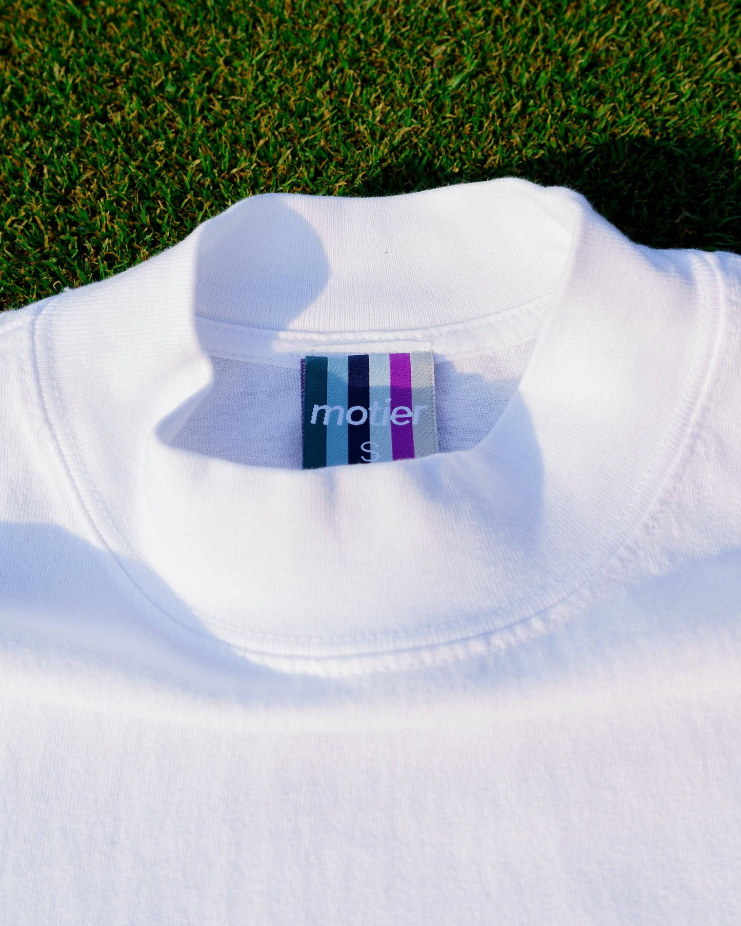 The Pin Mock Neck Luxe Tee (White/Navy)