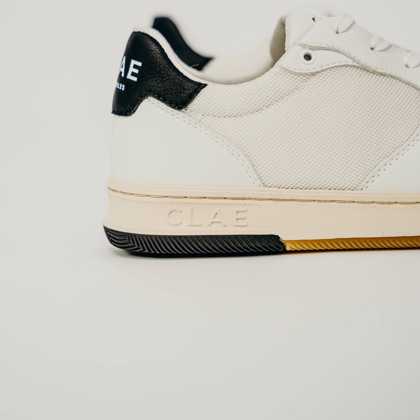 Clae Malone Lite Vegan (White/Black) - Motier Lafayette
