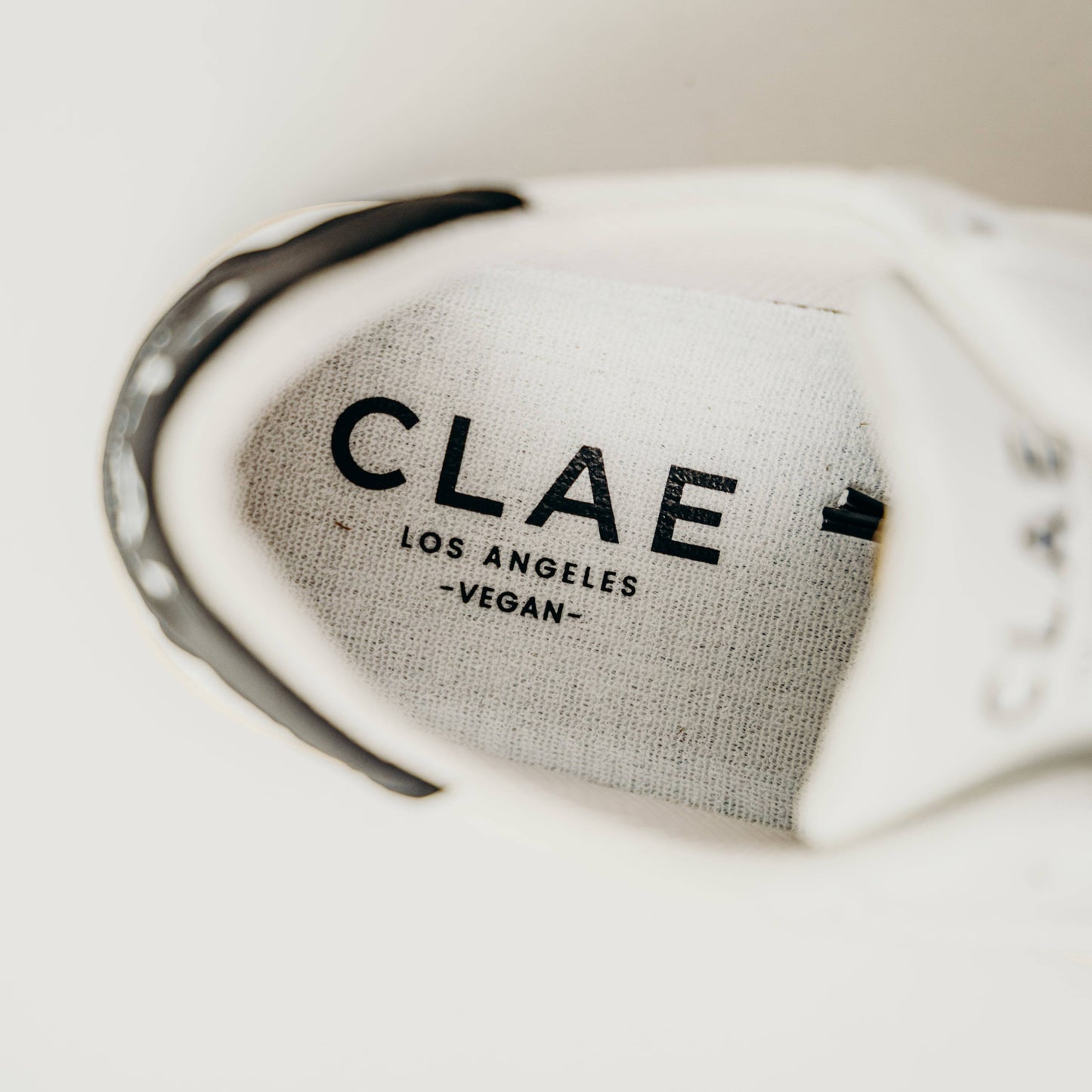 Clae Malone Lite Vegan (White/Black) - Motier Lafayette