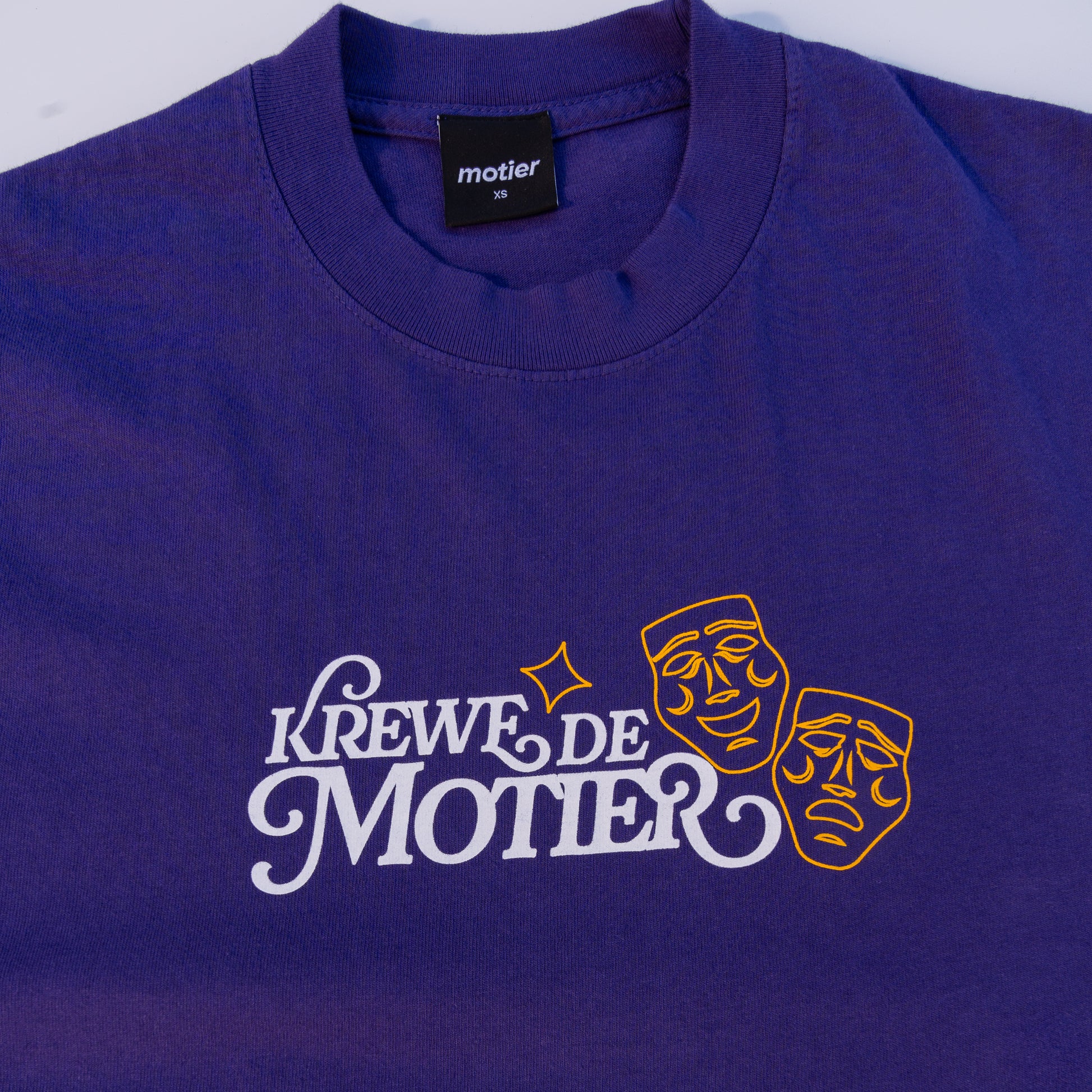 The Krewe De Motier 2025 Luxe Tee (Purple) - Motier Lafayette 