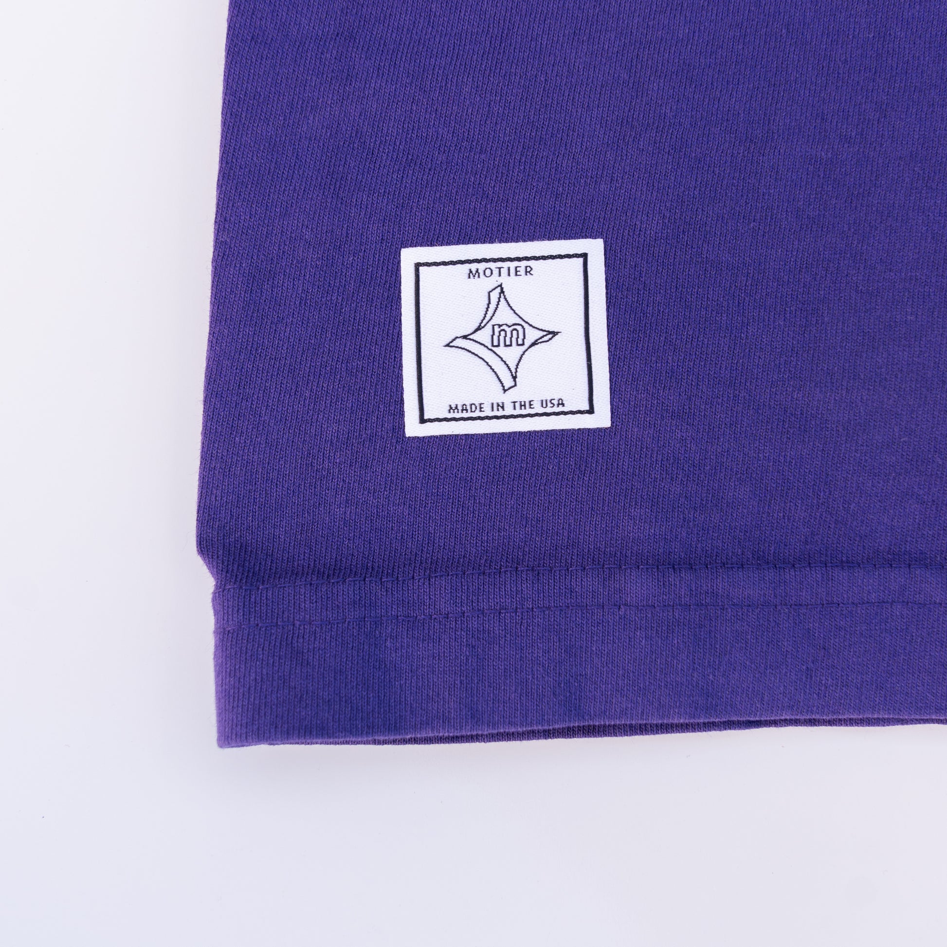 The Krewe De Motier 2025 Luxe Tee (Purple) - Motier Lafayette 