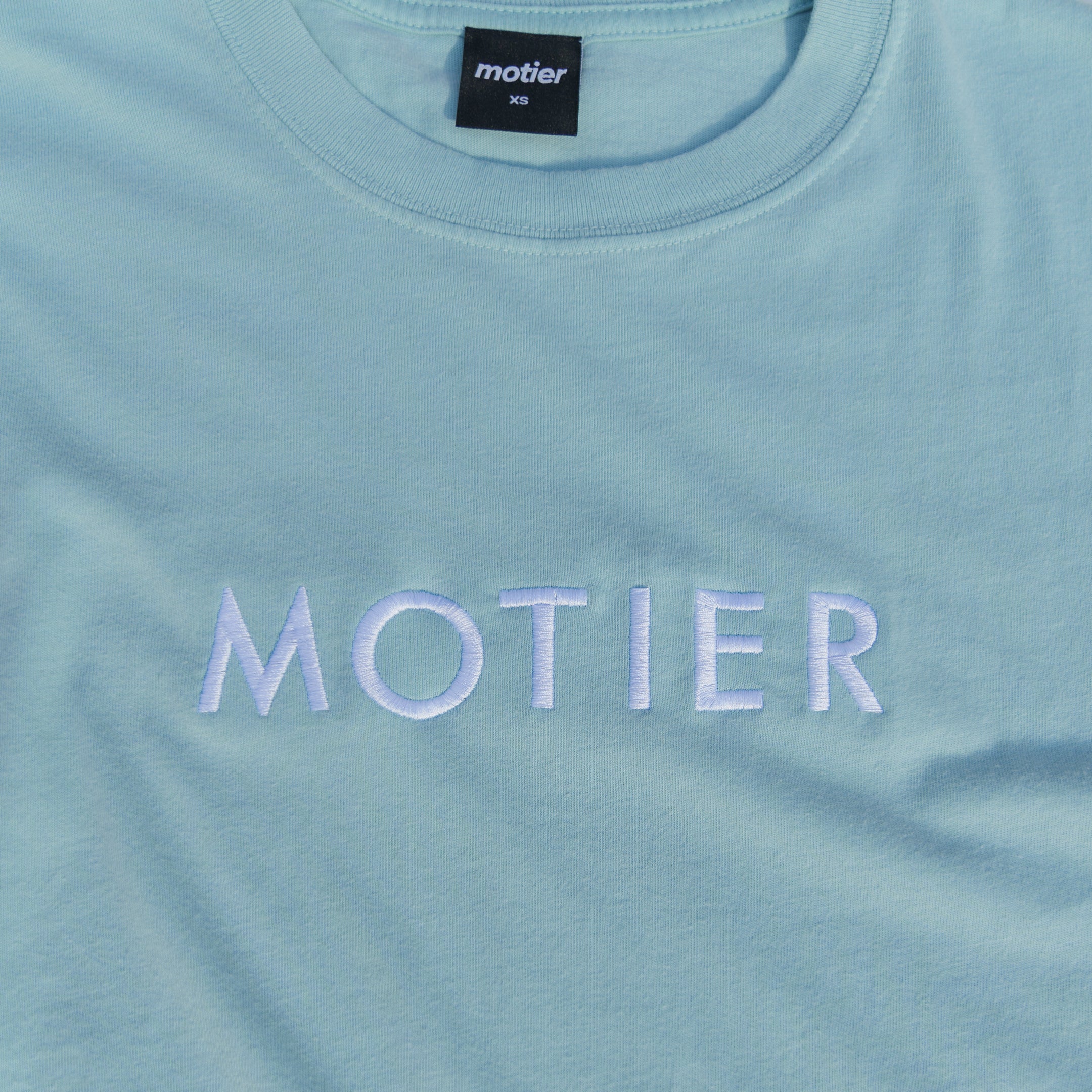 The Spaced Logo Embroidery Luxe Tee (Sterling Blue)