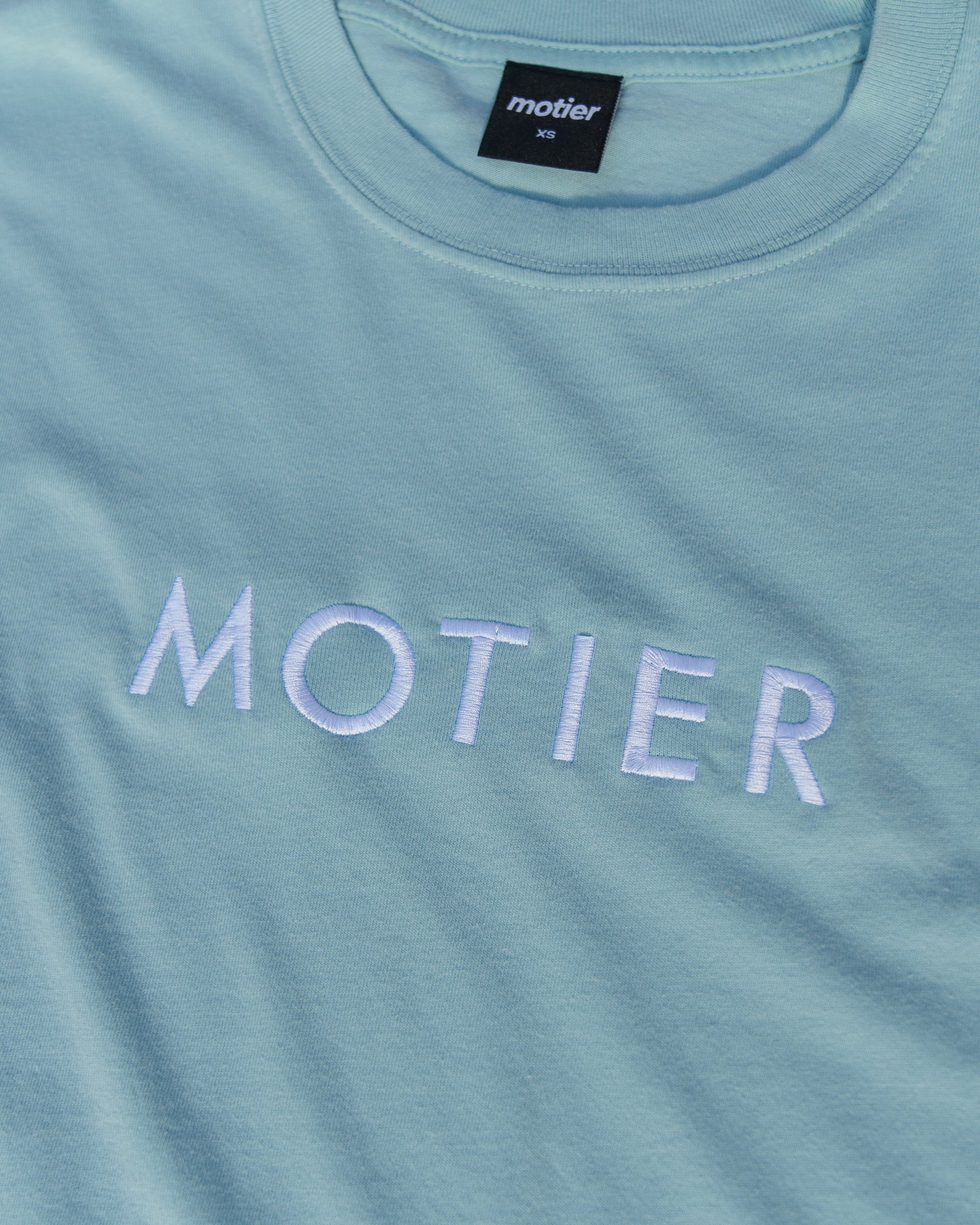 The Spaced Logo Embroidery Luxe Tee (Sterling Blue)