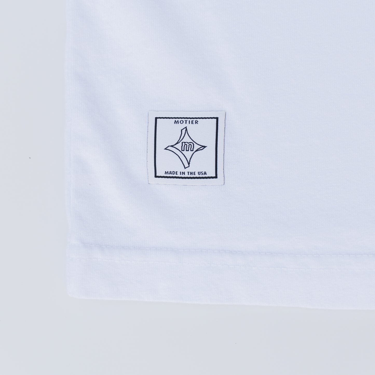 The Blur Butterfly Luxe Tee (White) - Motier Lafayette 