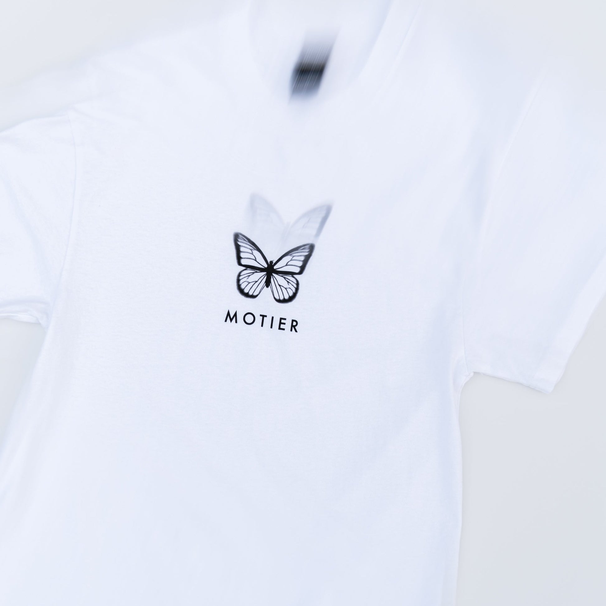 The Blur Butterfly Luxe Tee (White) - Motier Lafayette 