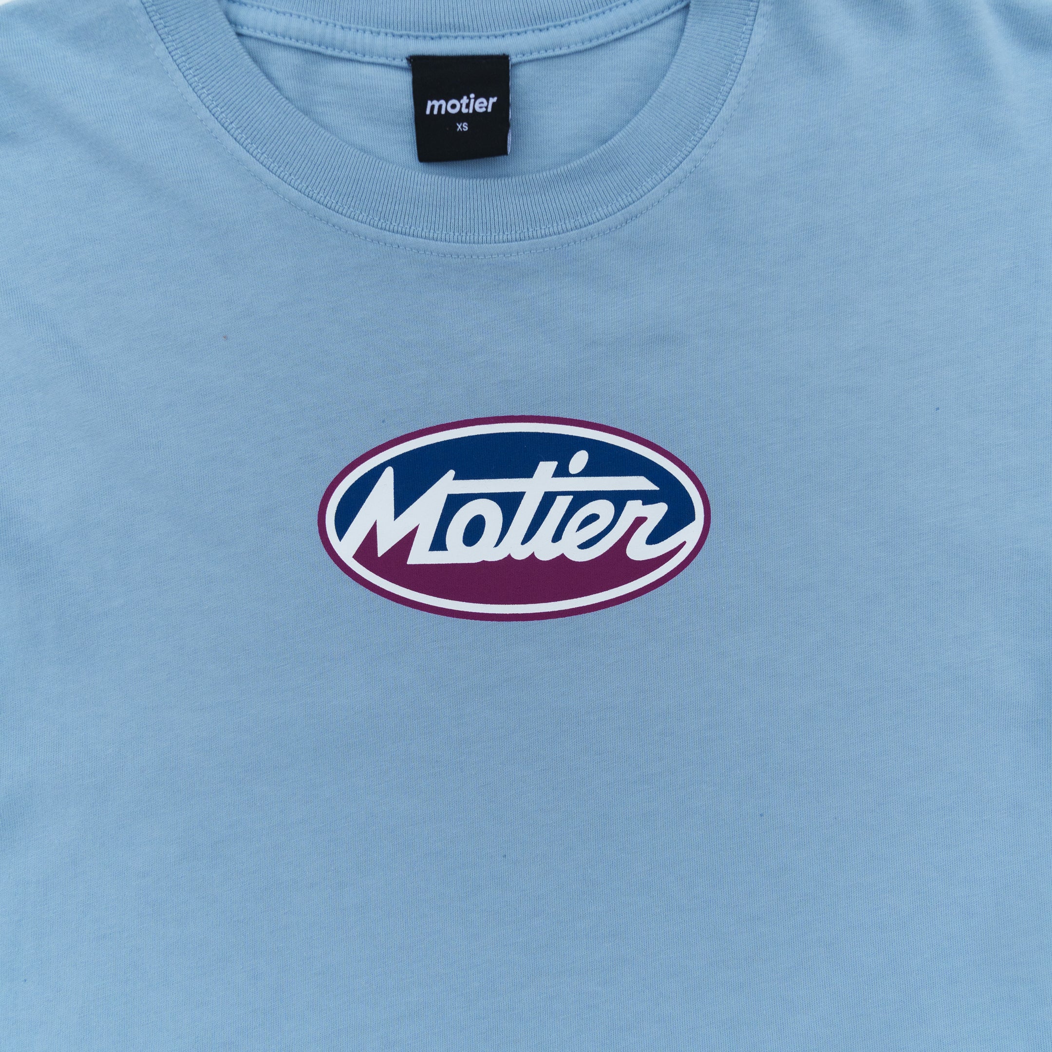 The Back of the Depot Signature Luxe Tee (Faded Denim) - Motier Lafayette 
