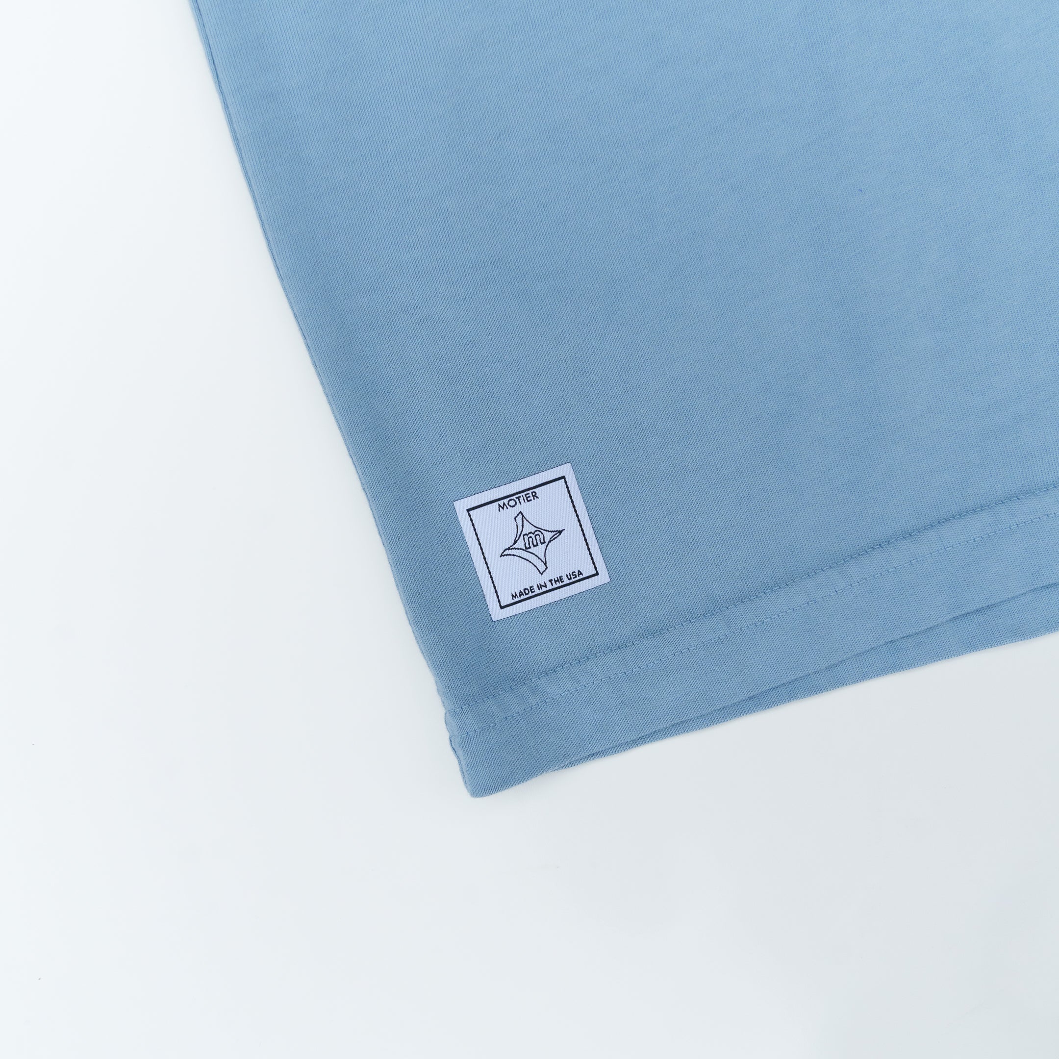 The Back of the Depot Signature Luxe Tee (Faded Denim) - Motier Lafayette 