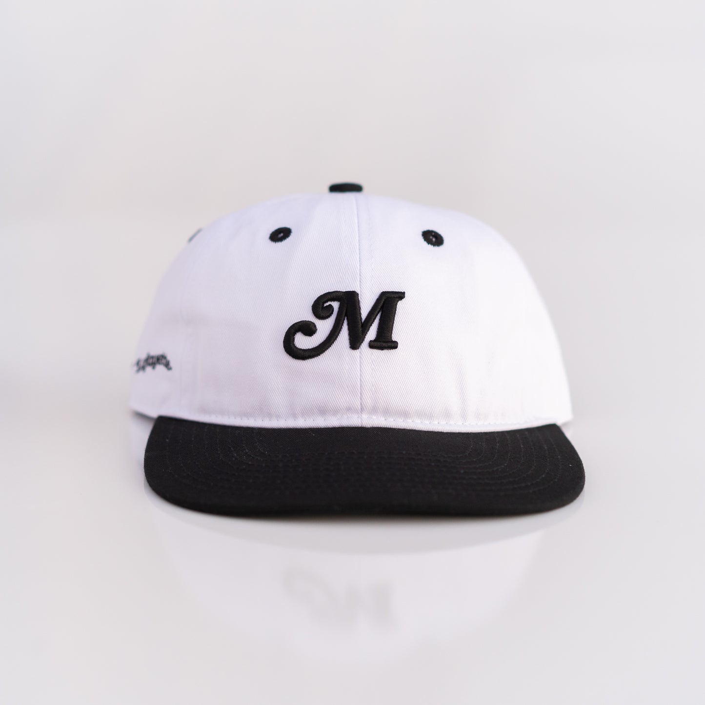 The Two Tone M Script Strapback (White/Black) - Motier Lafayette 