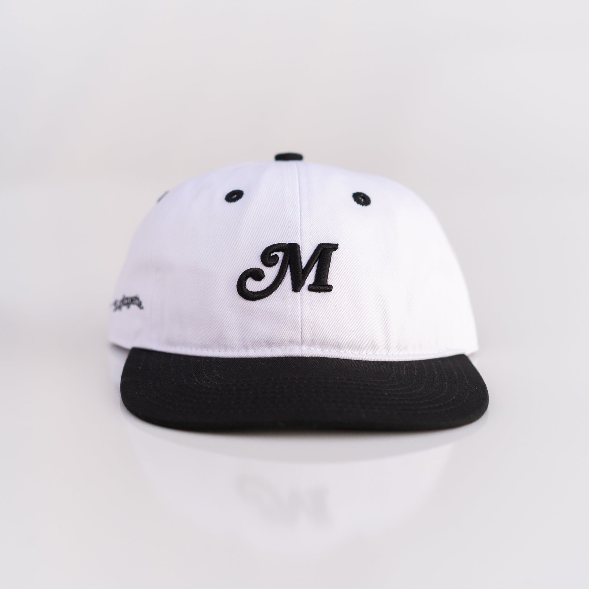 The Two Tone M Script Strapback (White/Black) - Motier Lafayette 