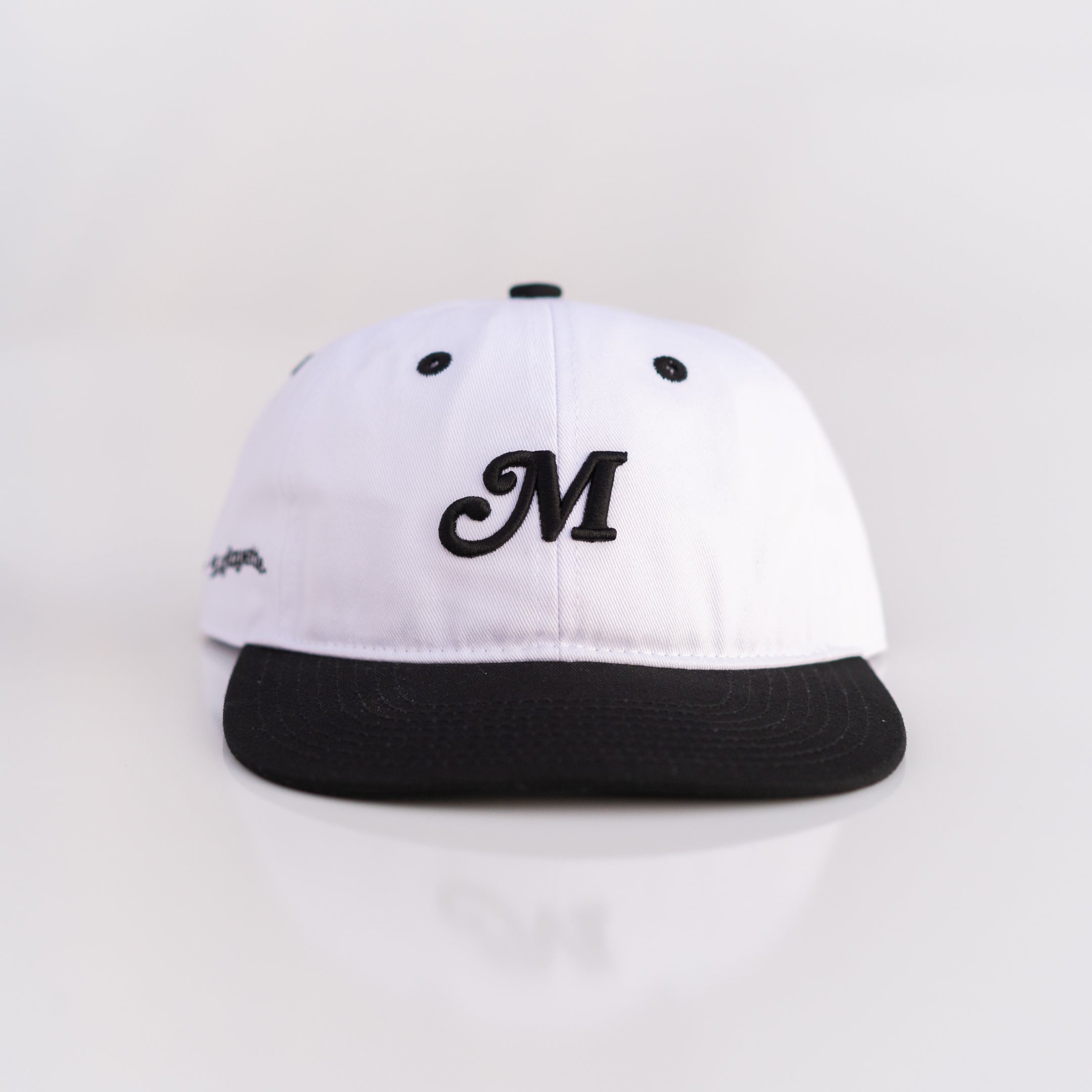 The Two Tone M Script Strapback (White/Black) - Motier Lafayette 