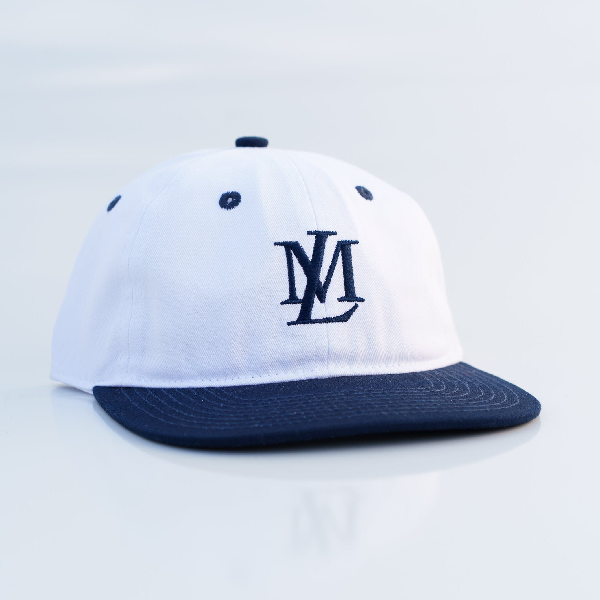 The Two Tone Insignia Strapback (White/Navy)