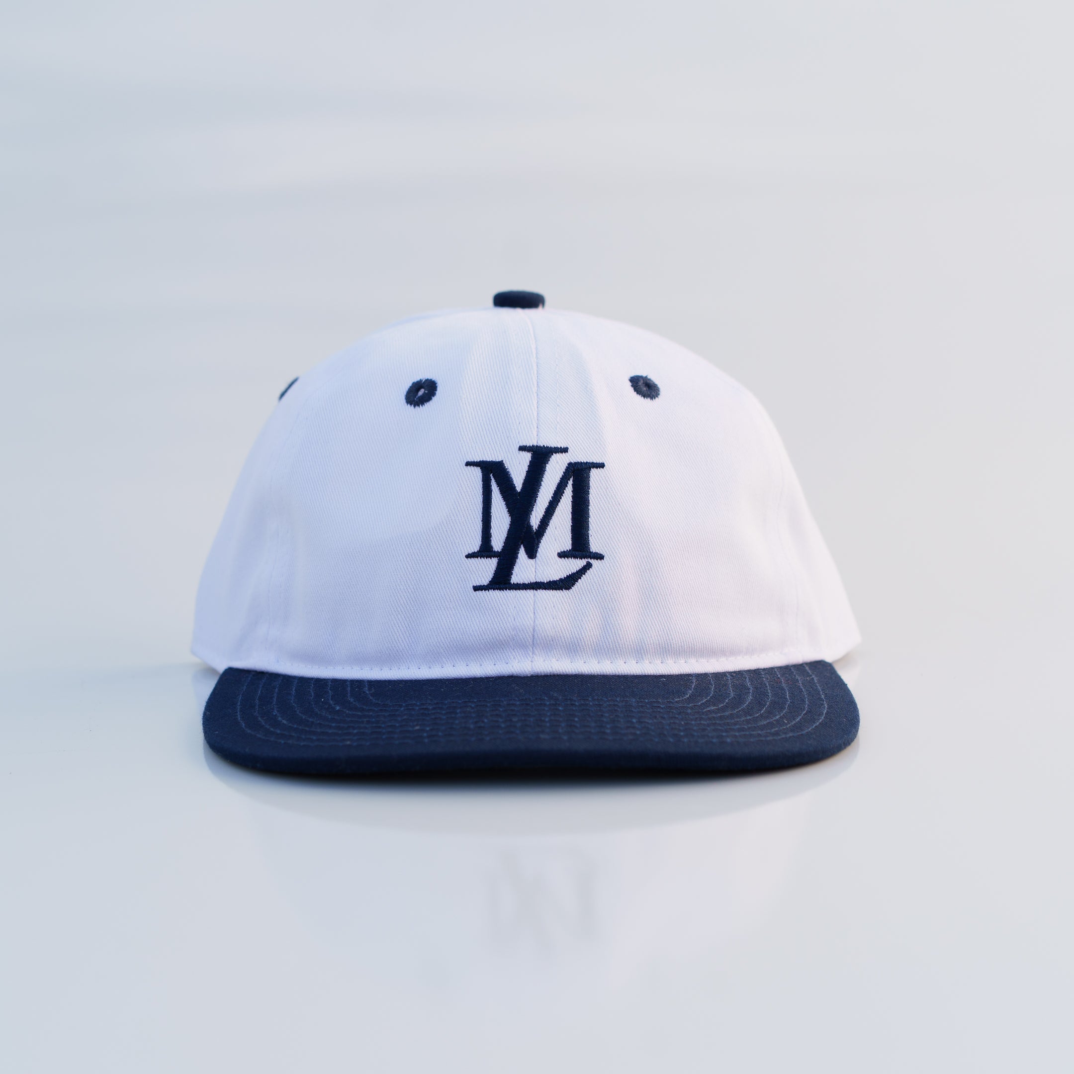 The Two Tone Insignia Strapback (White/Navy)