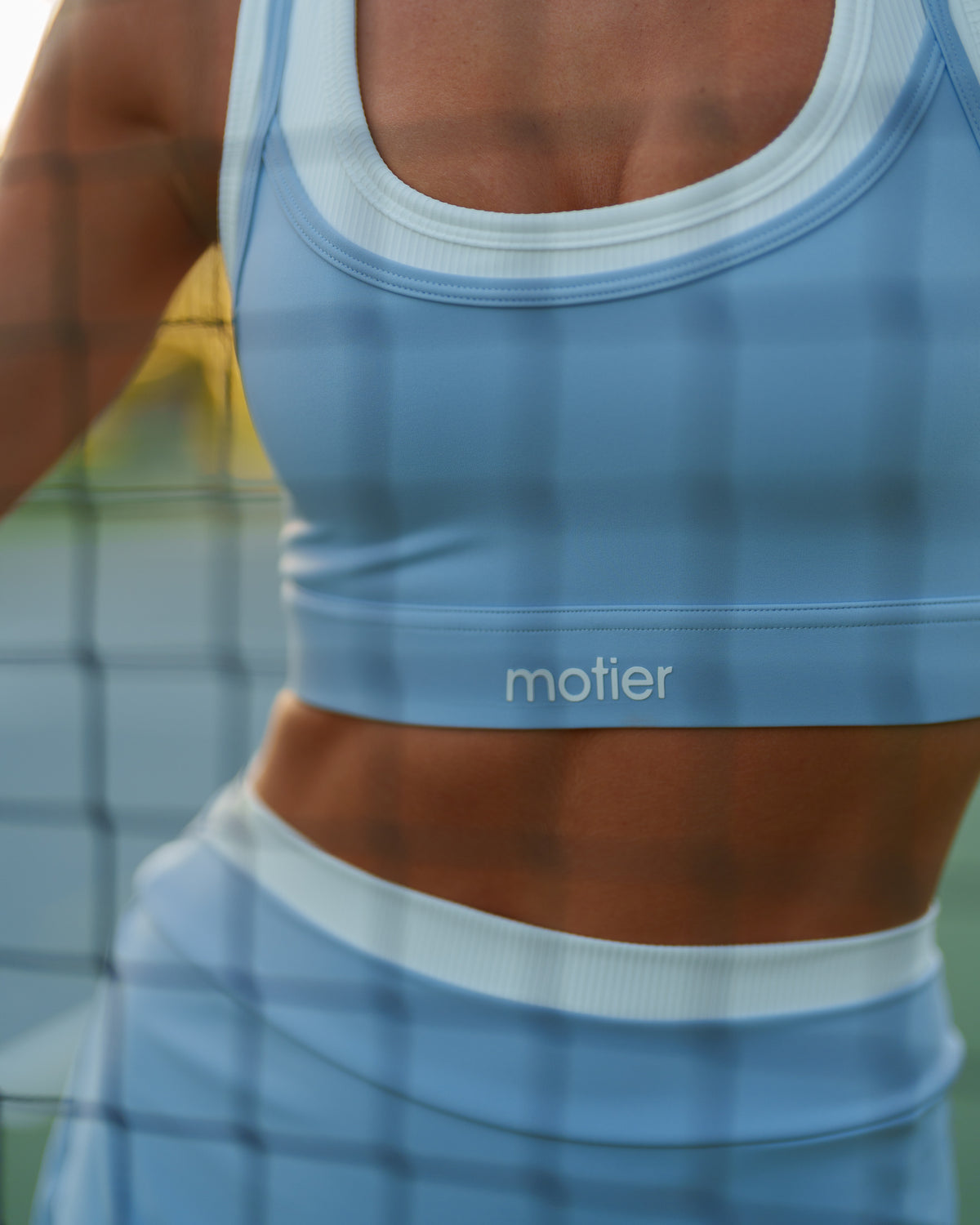 Motier Lafayette Sky Blue layered sports bra with supportive design and breathable fabric, ideal for activewear and workouts.