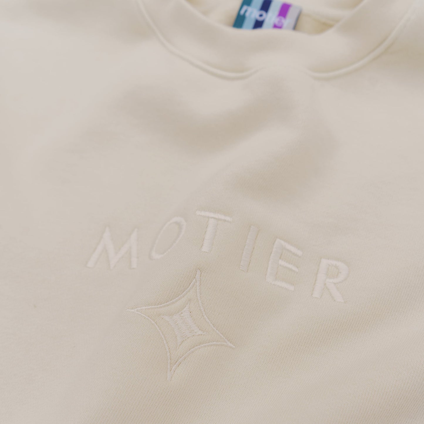 The Motier Astroid Embroidery Luxe Crewneck (White Sand)