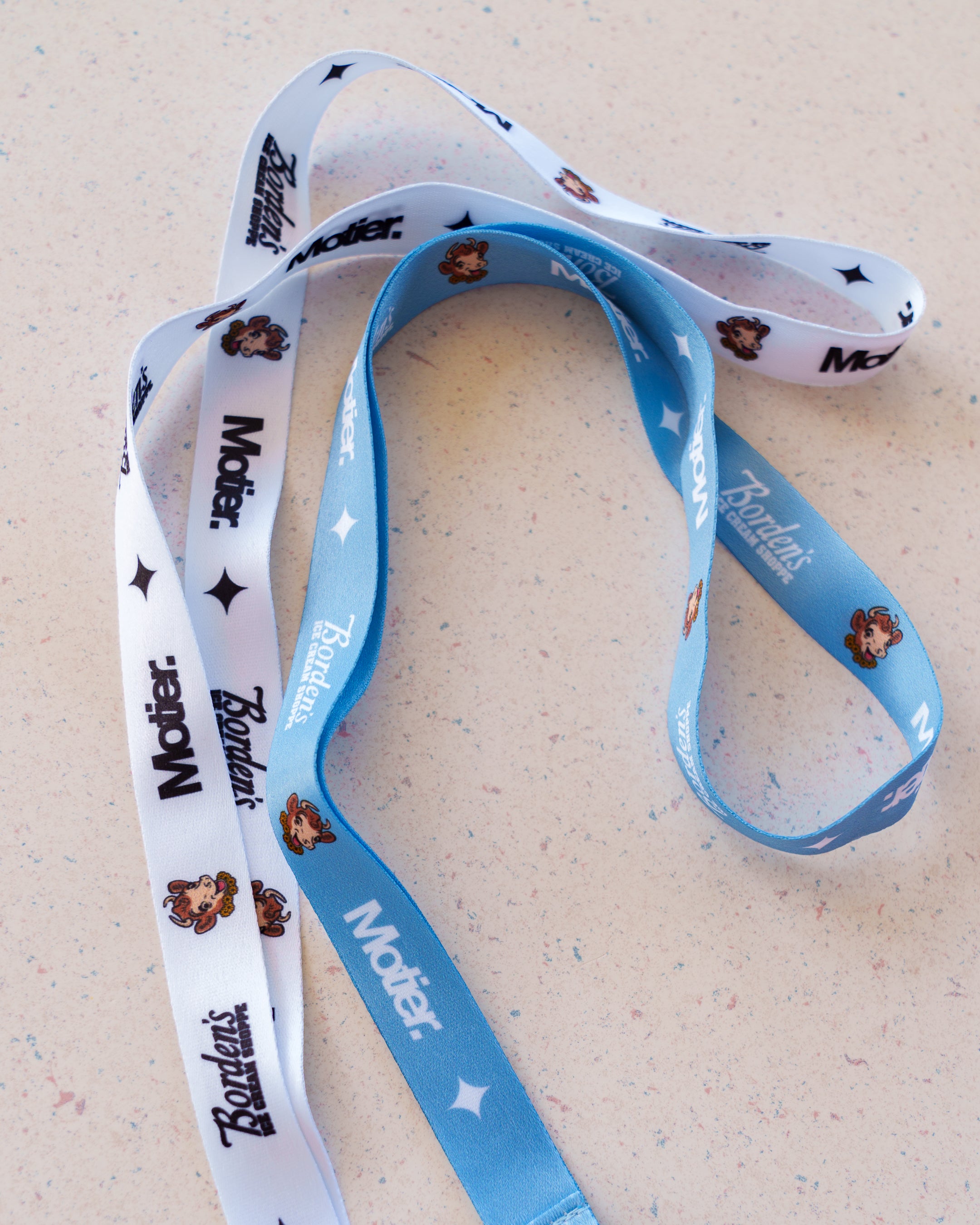 Motier Lafayette Borden's Ice Cream Shoppe lanyard with colorful design and plastic clip, perfect for holding keys or ID badges