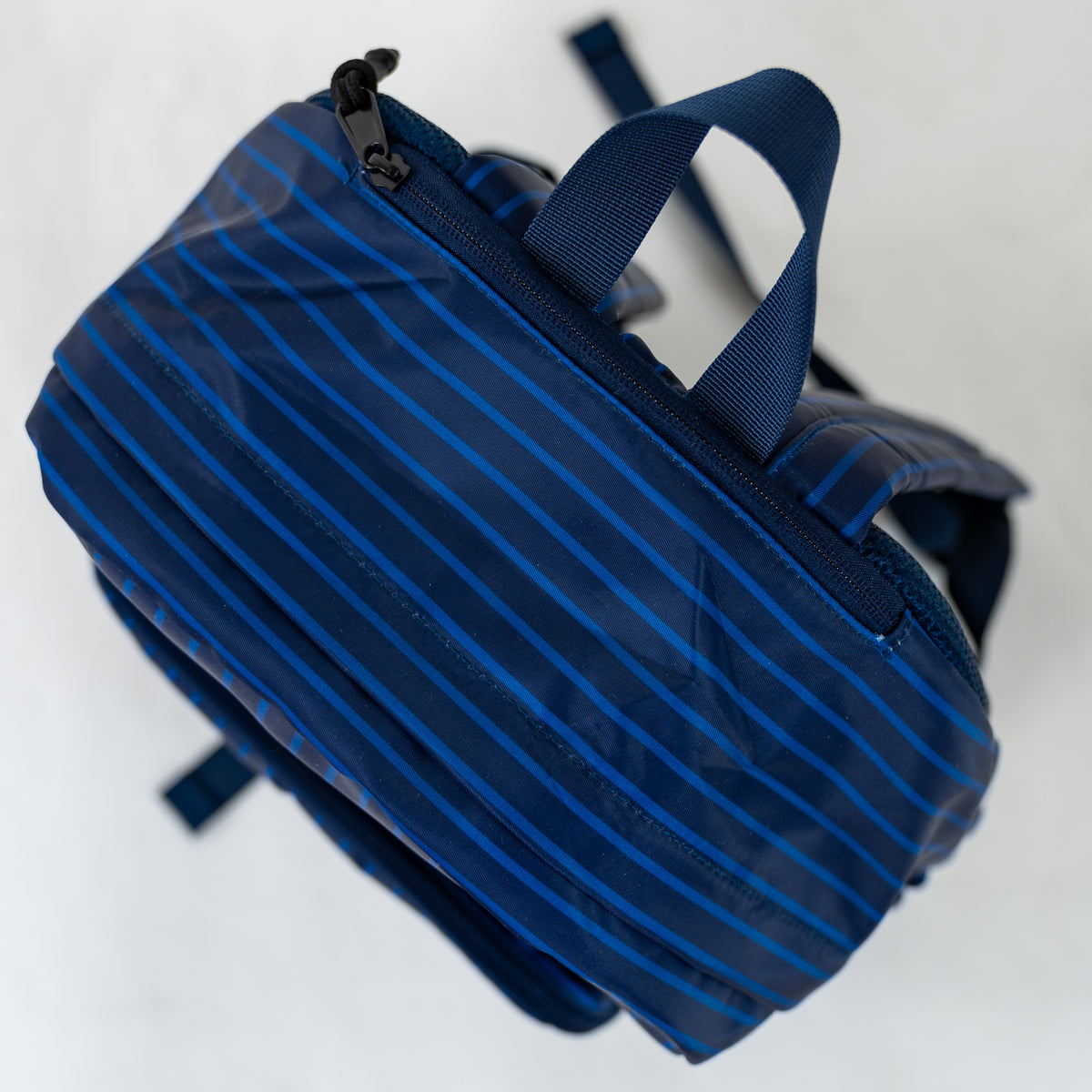 Motier Lafayette The Legacy II Pinstripe Backpack in navy with adjustable straps and multiple compartments, stylish and functional.