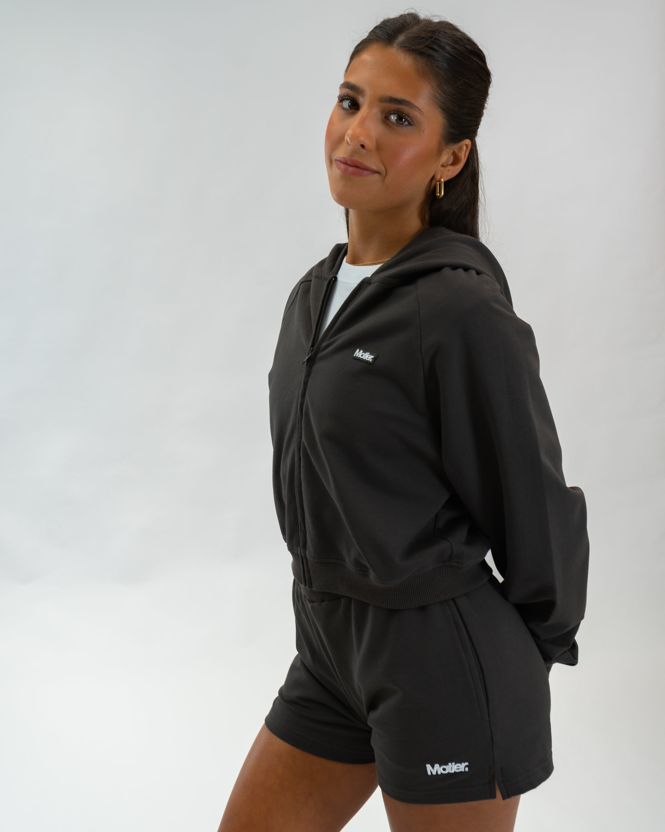 Motier Lafayette Refresh Full-Zip Hoodie in Brownstone, shown in asphalt color, with a front zipper and comfortable fit.