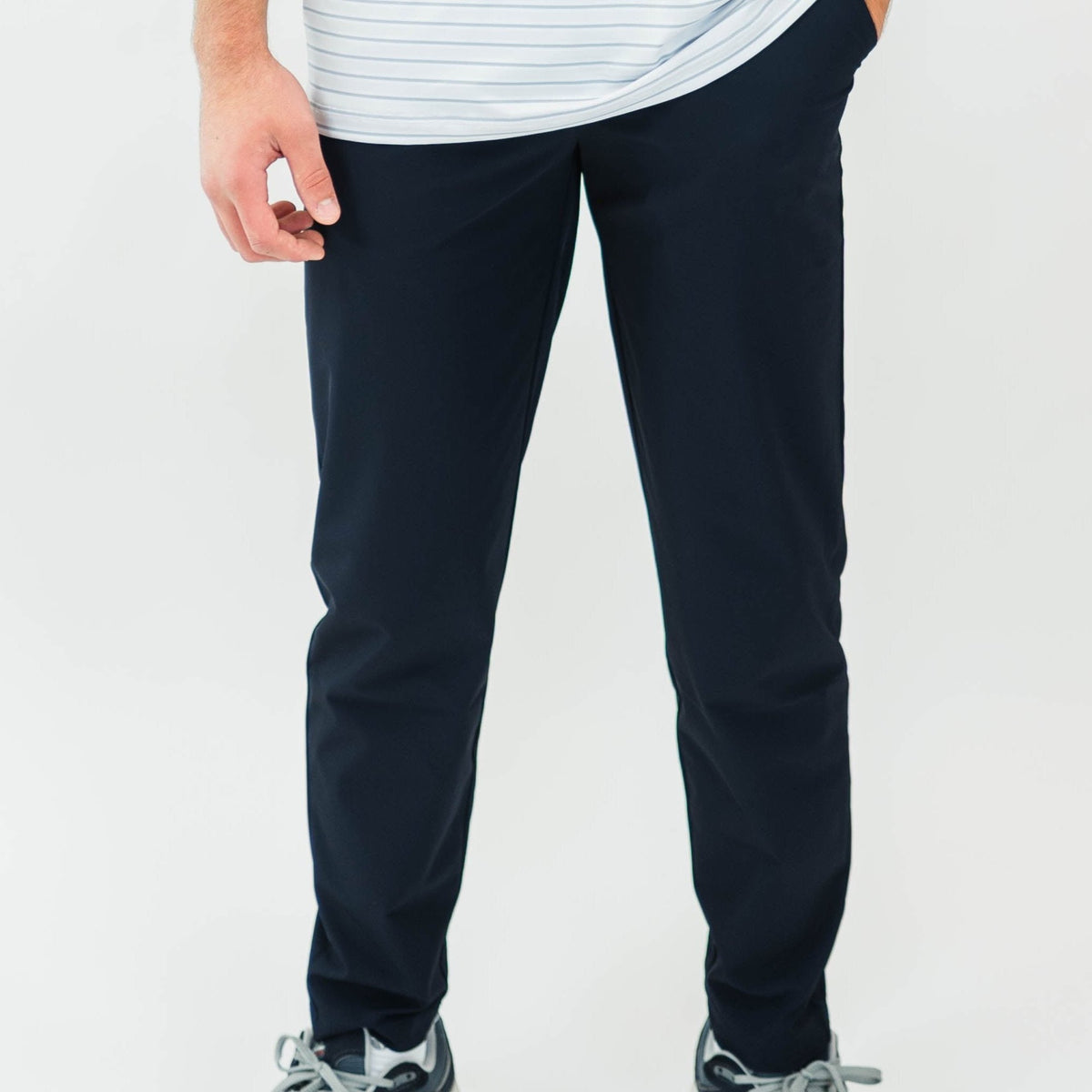 Motier Lafayette Rusty Marquis Navy pants, stylish men's trousers with a tailored fit and classic design, shown on a hanger.