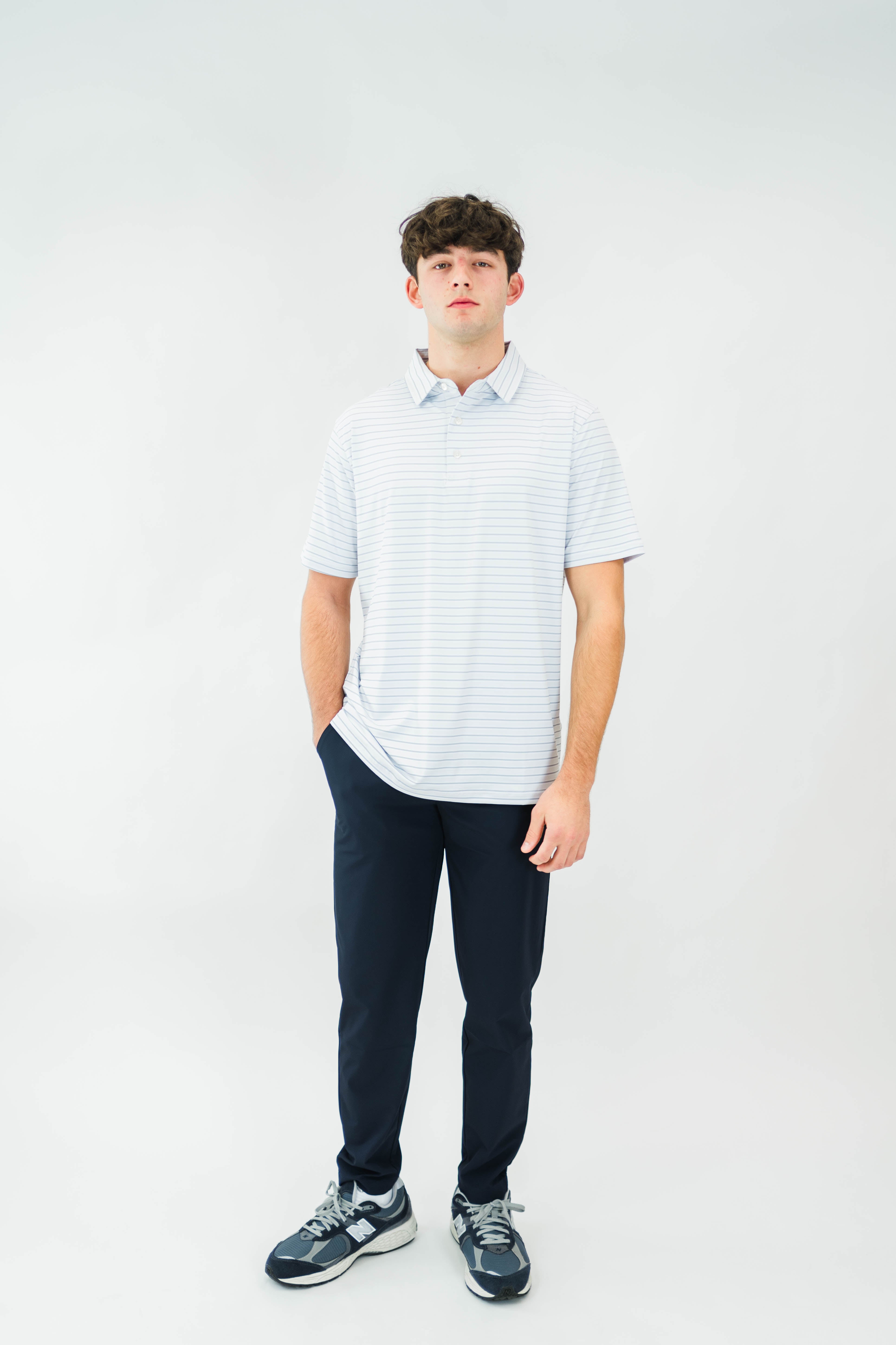 Navy Rusty Marquis pants by Motier Lafayette, shown on model, featuring tailored fit and stylish design, front view.