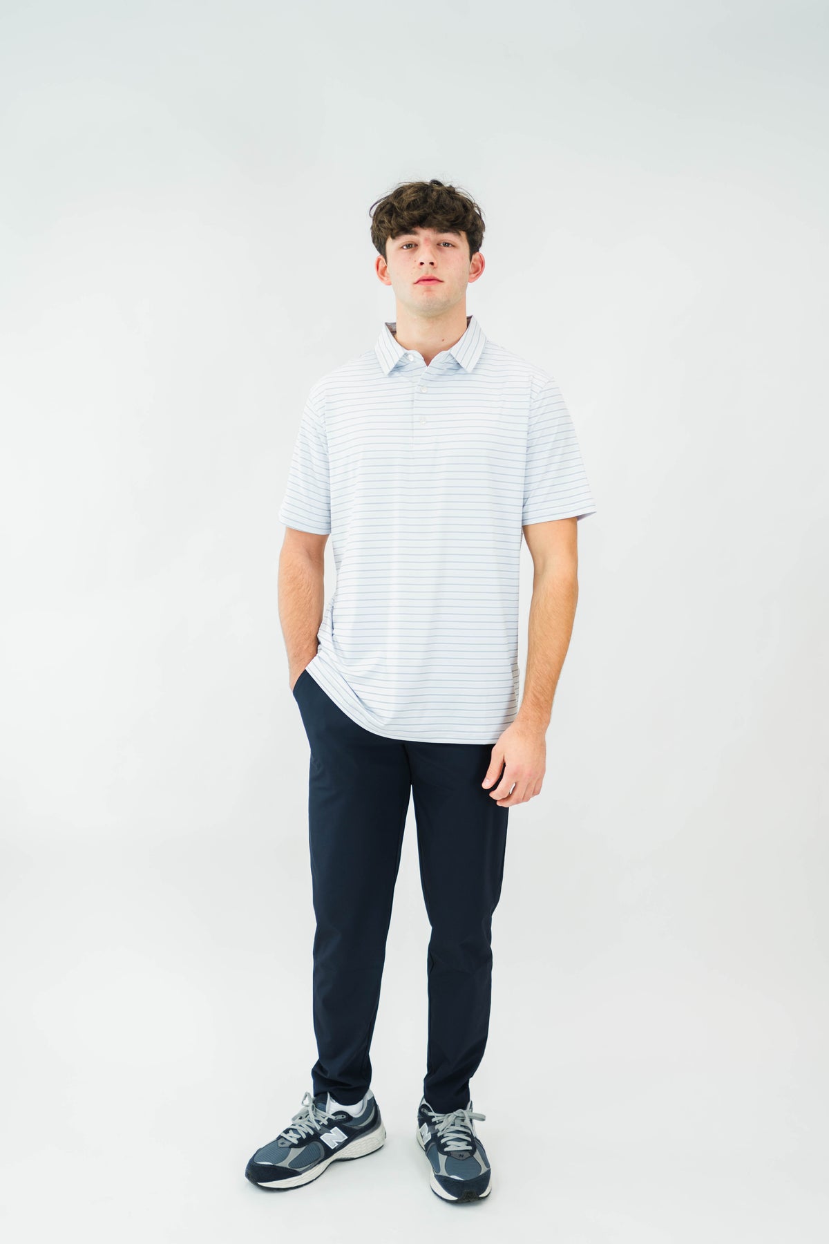 Navy Rusty Marquis pants by Motier Lafayette, shown on model, featuring tailored fit and stylish design, front view.