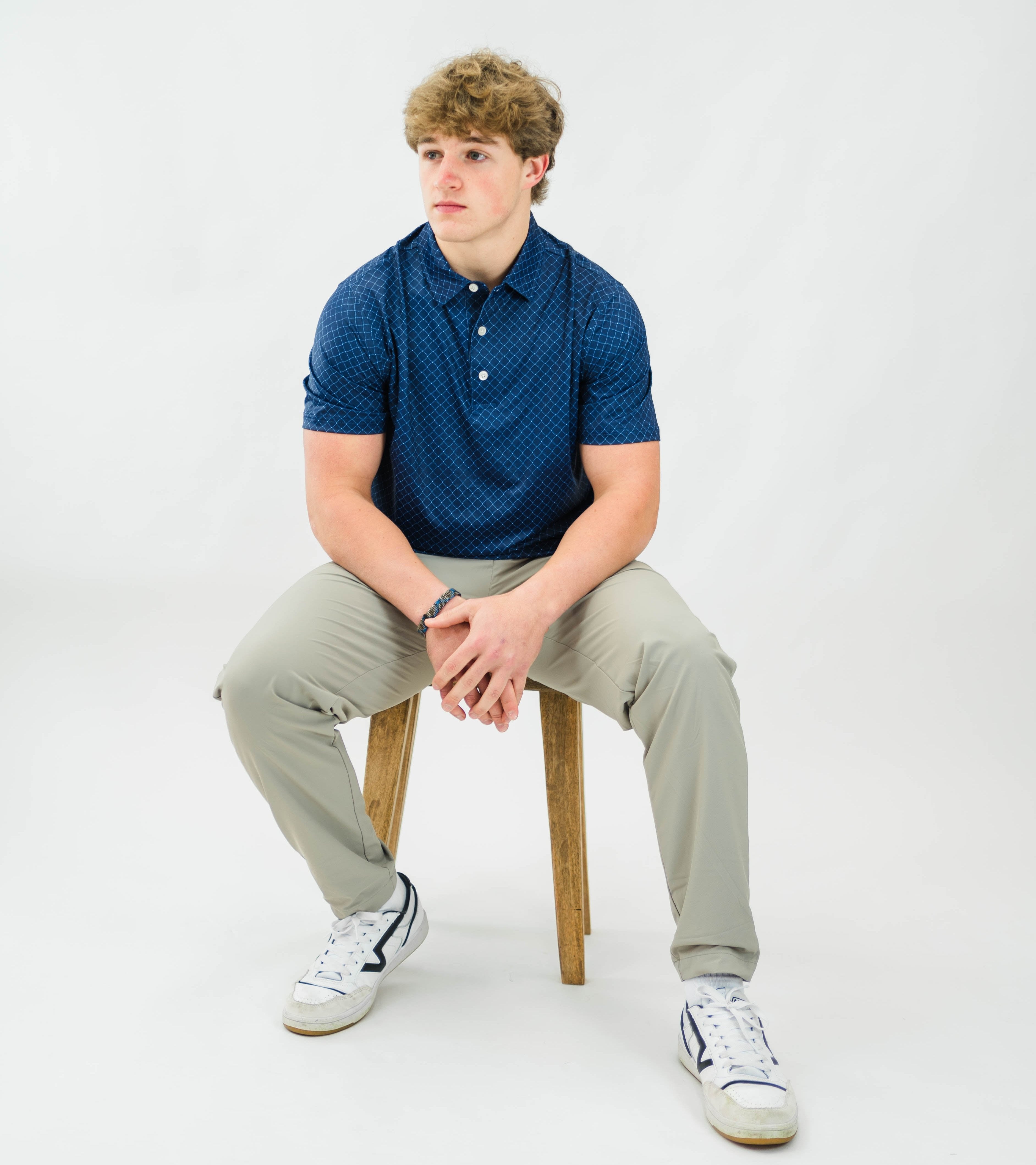 Motier Lafayette Rusty Marquis Tan pants with a relaxed fit, shown laid flat on a white background.