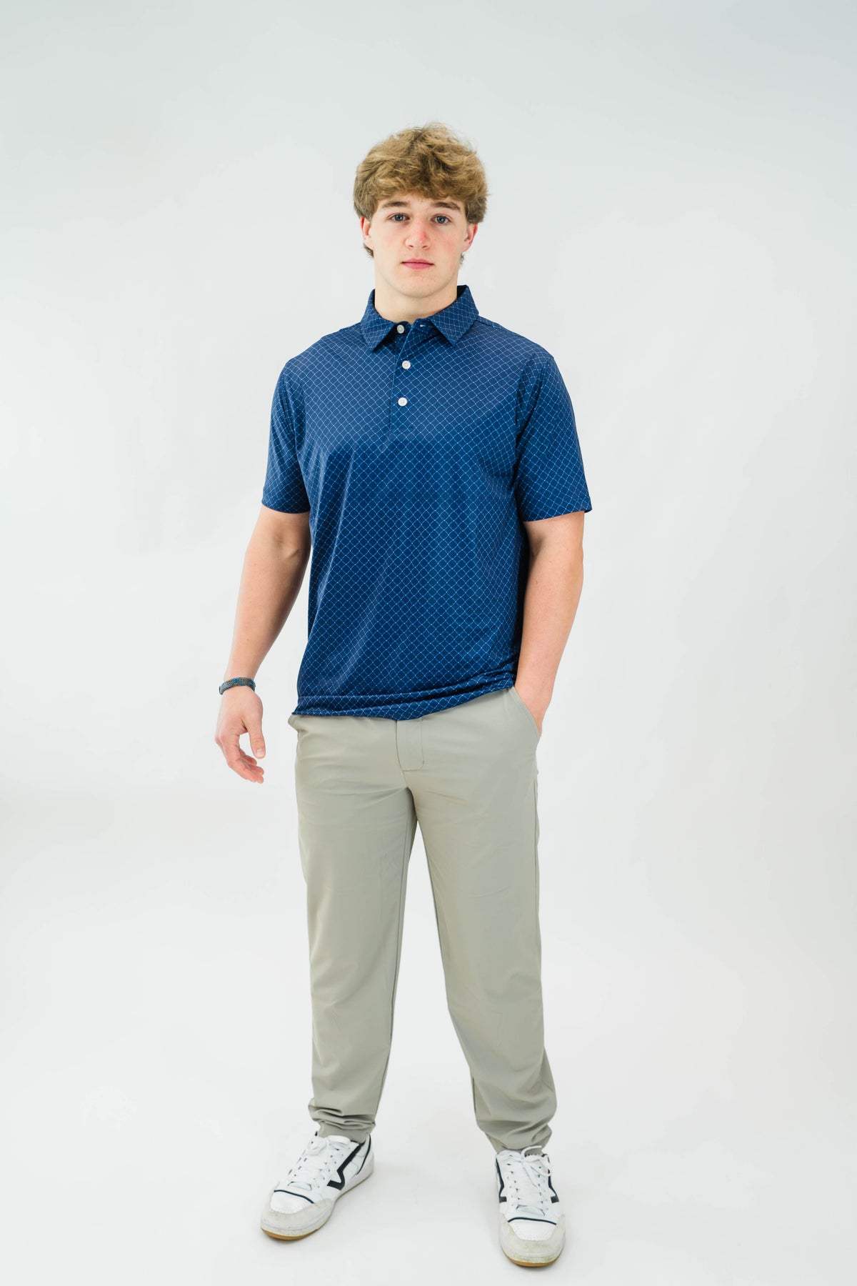Motier Lafayette Rusty Marquis Pant in tan, stylish men's pants displayed on a hanger with a focus on fabric and fit.