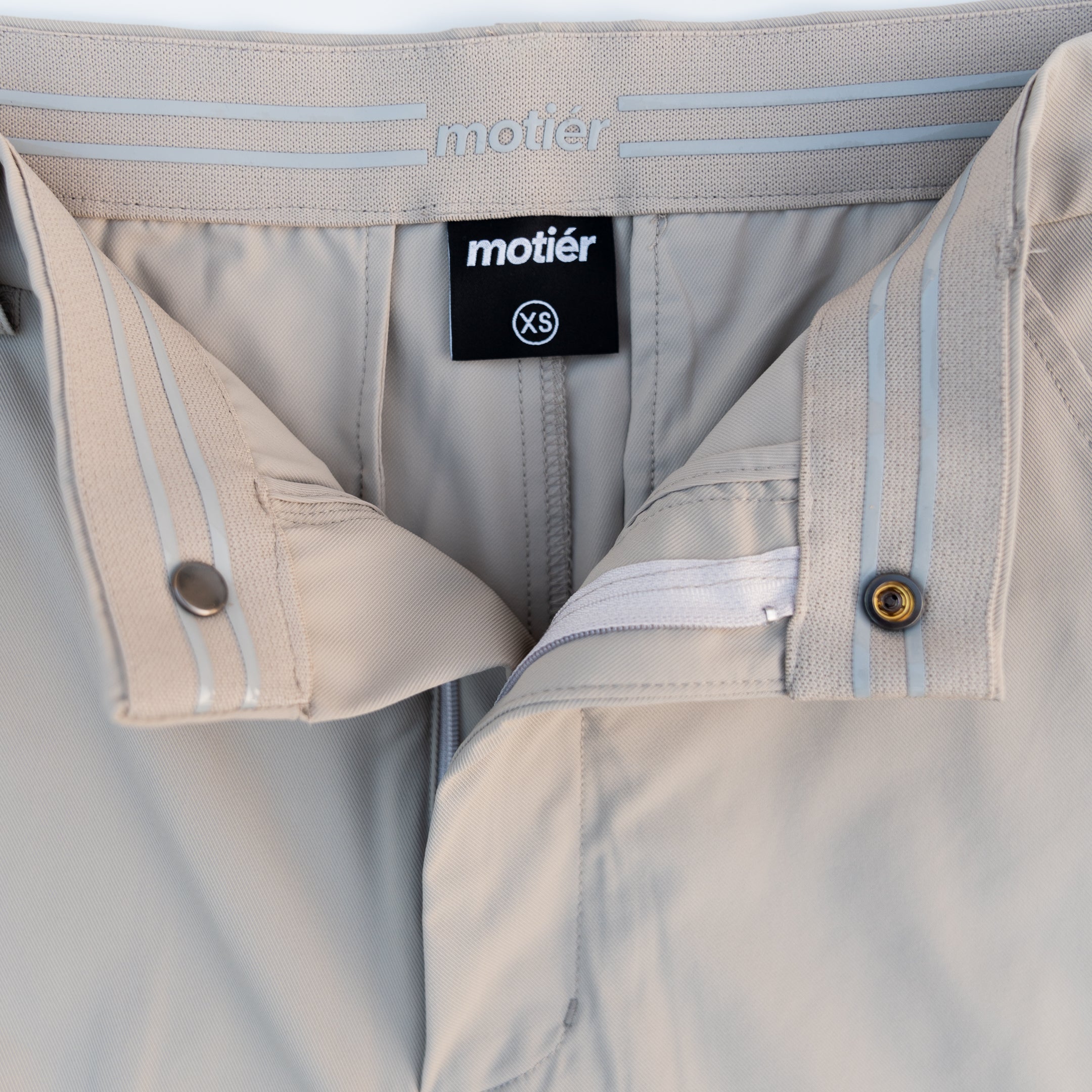 Tan Rusty Marquis pants by Motier Lafayette, featuring a stylish fit and casual design, displayed on a model.