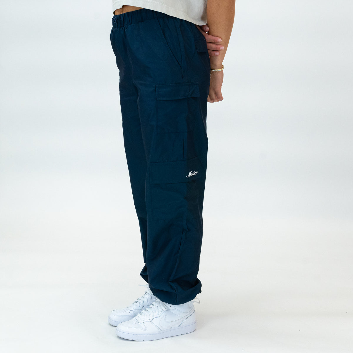 Navy women's nylon track pants by Motier Lafayette, slim fit with elastic waistband and side pockets.