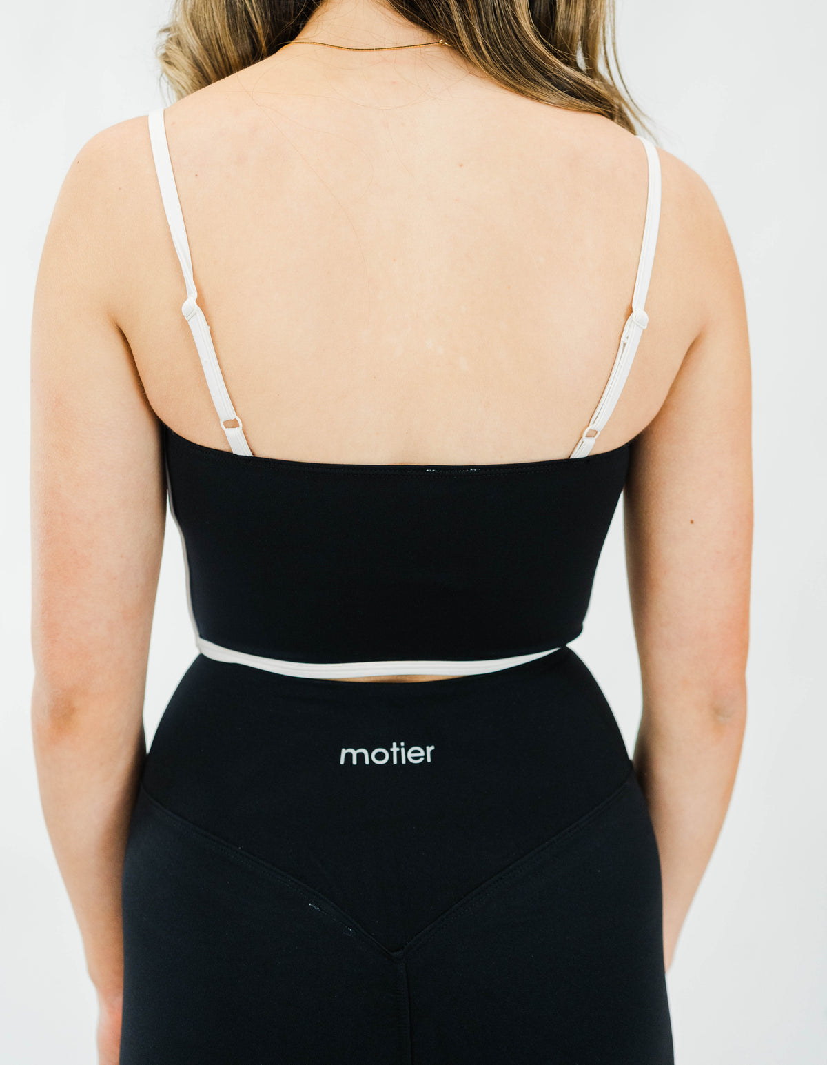 Black Motier Lafayette Women's Sculpting Bra with supportive fit and smooth fabric, designed for comfortable shaping.
