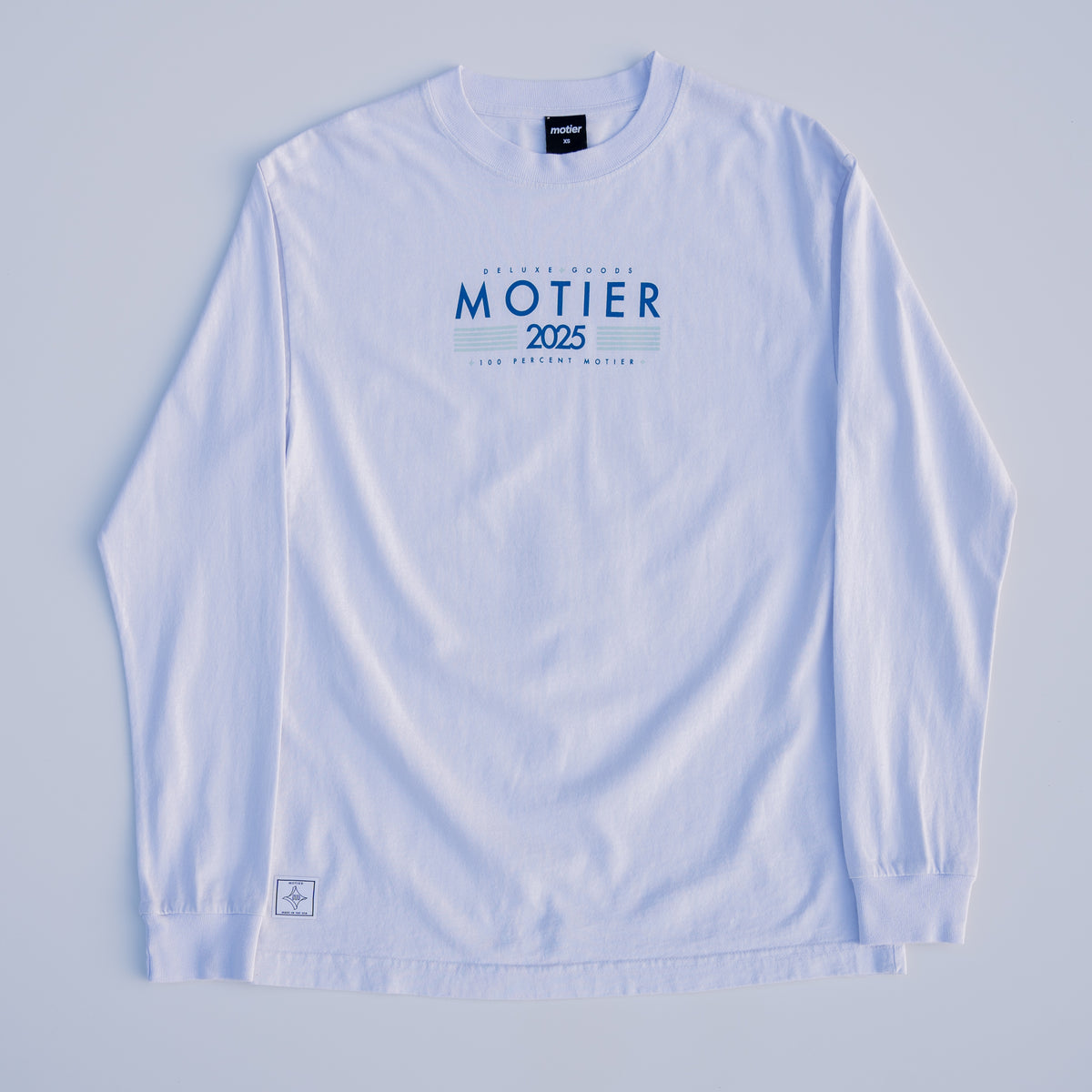 Motier Lafayette Framework Long Sleeve Premium Luxe Tee in Cloudrift, soft fabric, fitted design, shown on a mannequin.