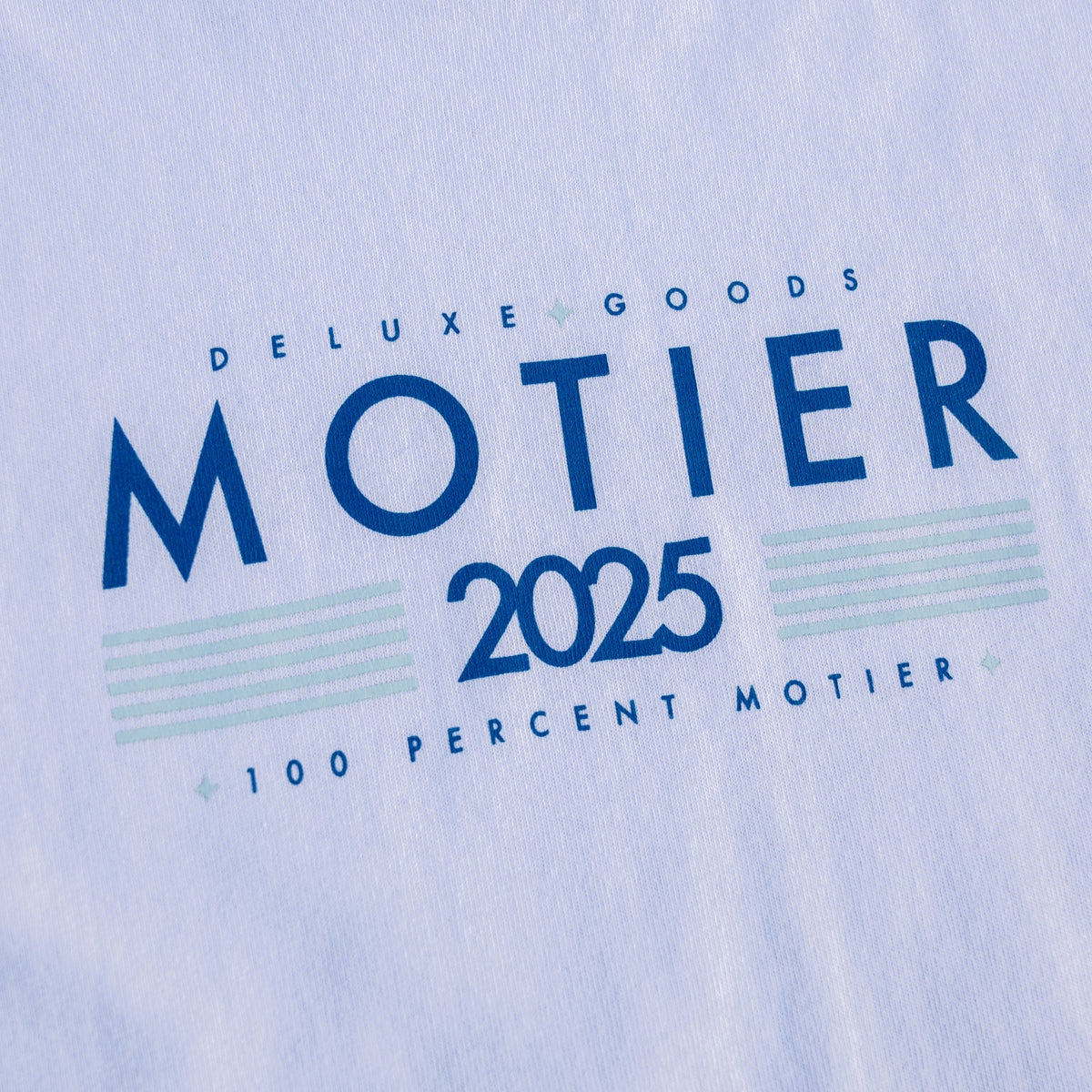 Motier Lafayette The Framework Long Sleeve Premium Luxe Tee in Cloudrift, lightweight soft fabric, close-up of the fitted long sleeve shirt.