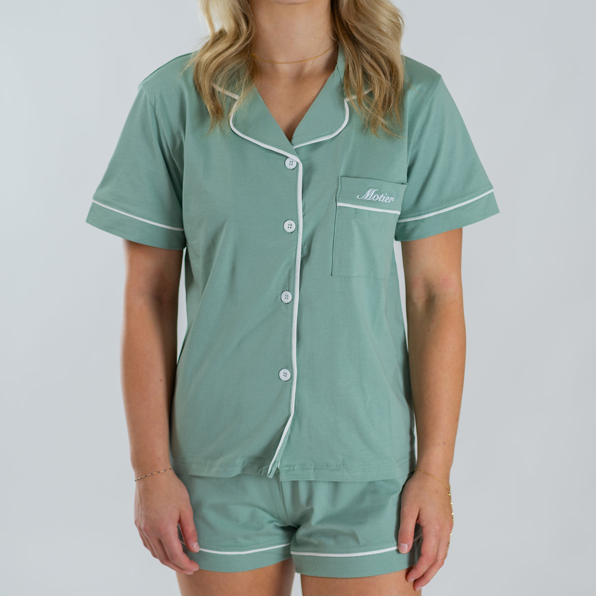 Motier Lafayette Essential Pajama Set in pastel green, featuring soft fabric, long sleeves, and matching pants for comfortable sleepwear.