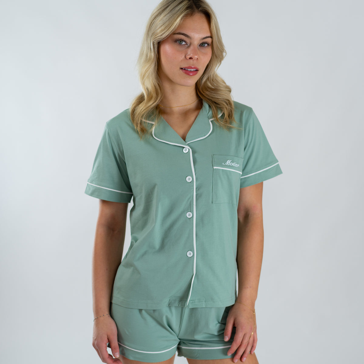 Motier Lafayette Essential Pajama Set in pastel green, soft fabric, featuring a relaxed fit and matching top and bottoms.