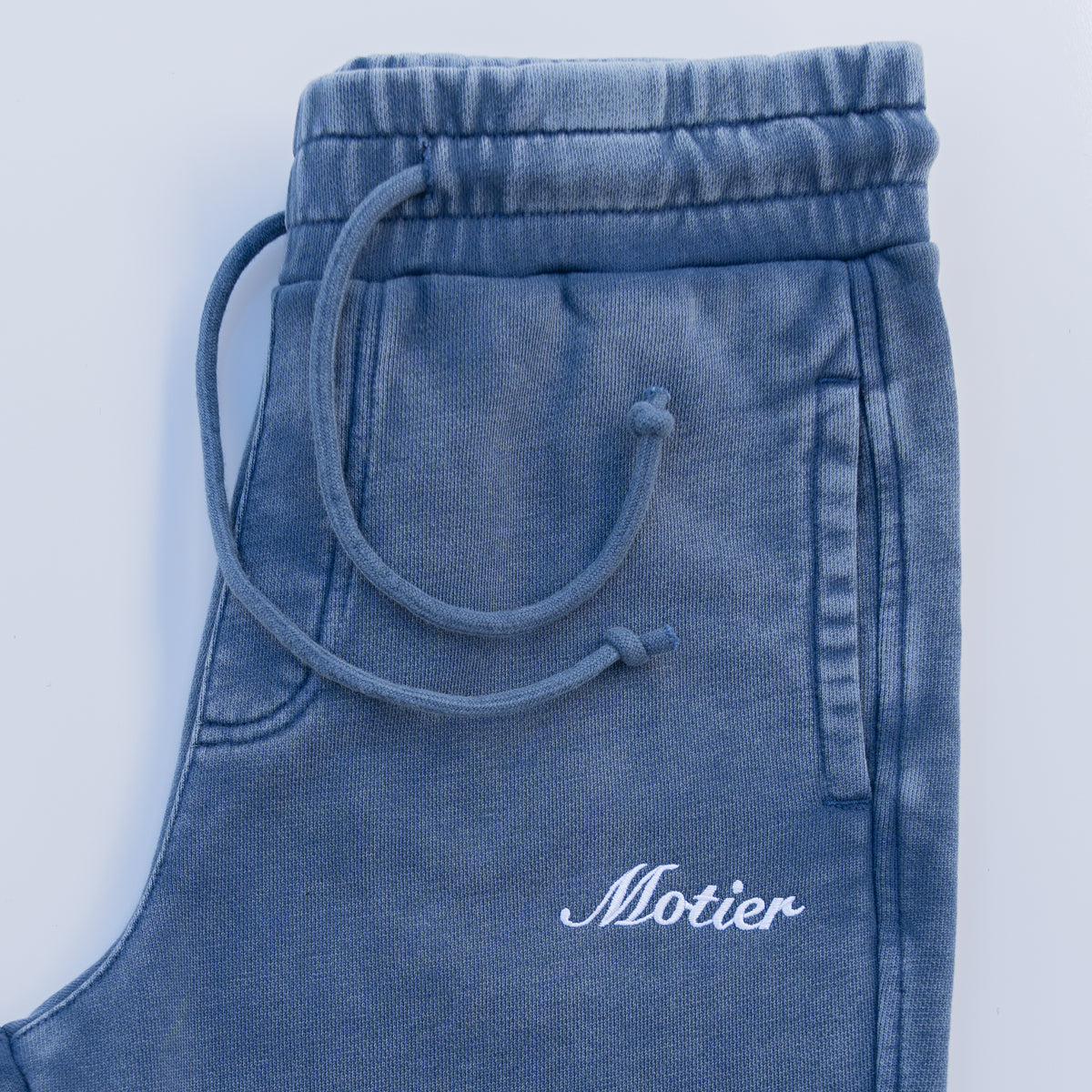 Motier Lafayette Vital Signature Sweatpants in infinity color, casual fit, soft fabric, shown on a model.