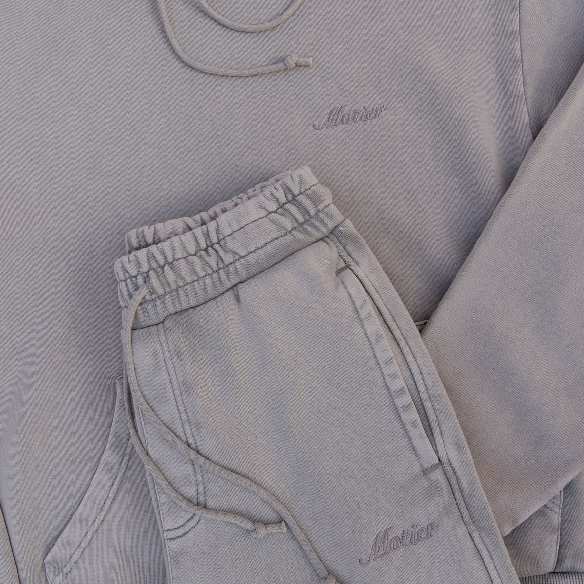 Motier Lafayette Vital Signature Sweatpants in Paloma color, shown in XS size, featuring a comfortable, relaxed fit and soft fabric.