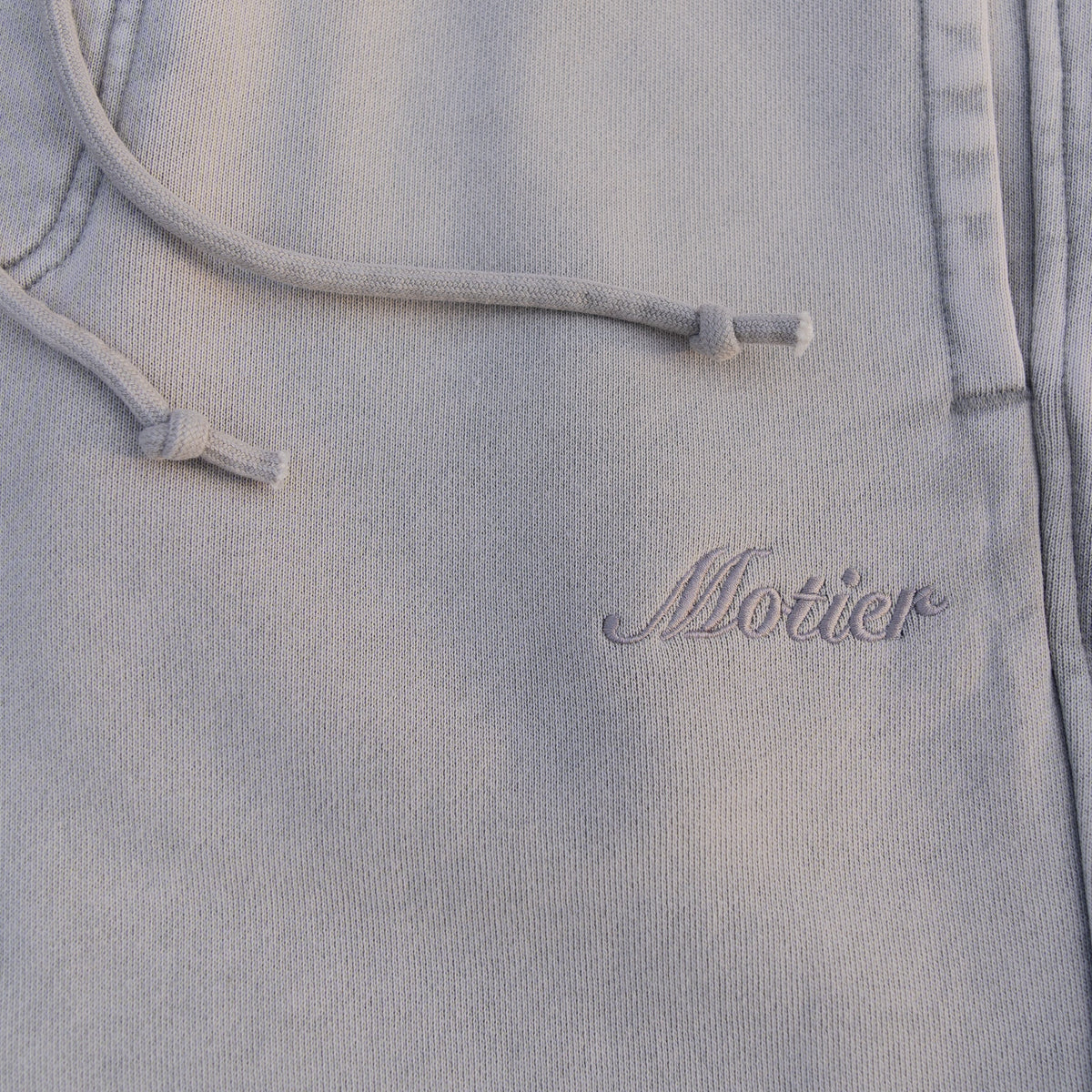 Motier Lafayette Vital Signature Sweatpants in Paloma color, slim fit, soft fabric, featuring a comfortable waistband and relaxed style.