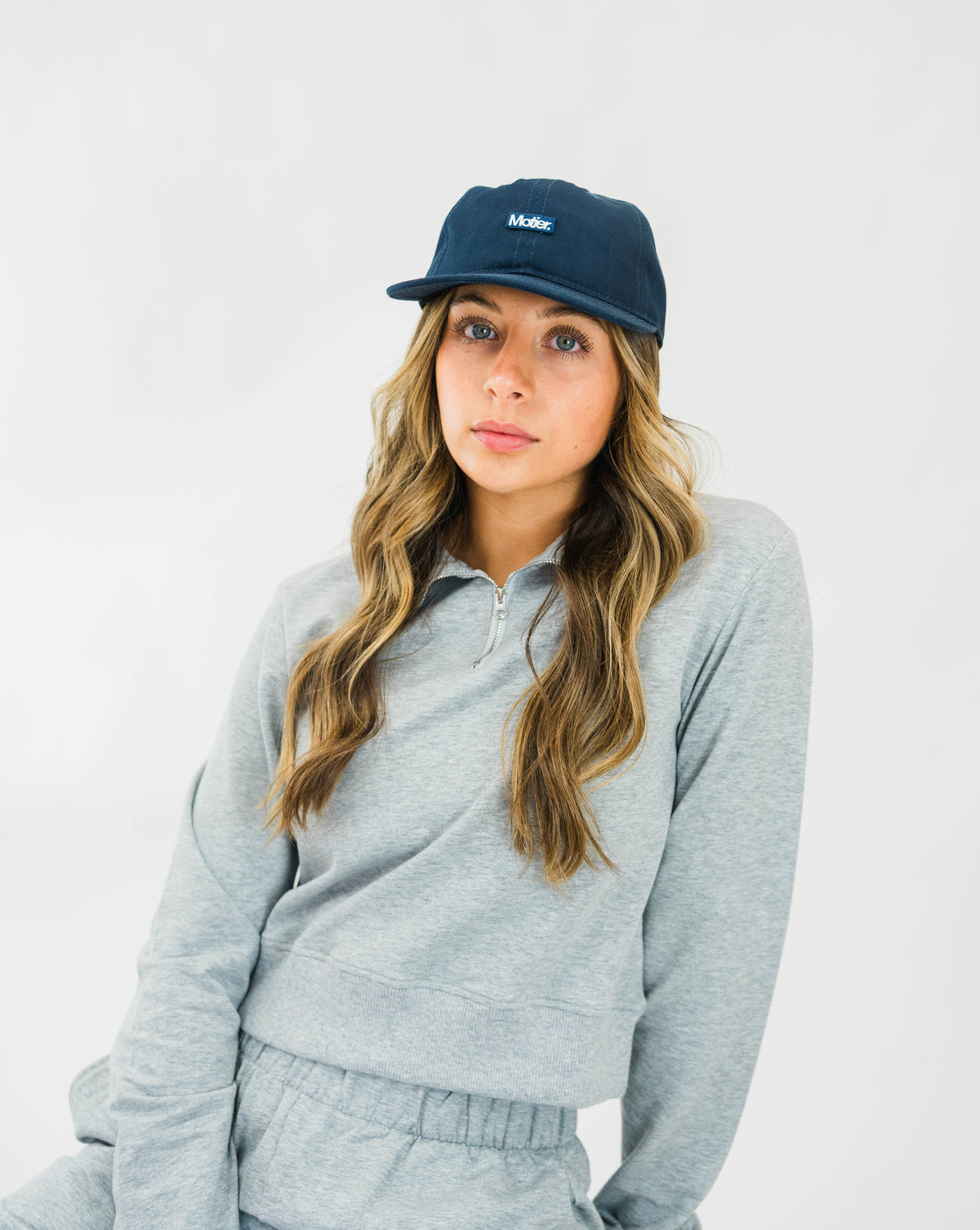 Grey Motier Lafayette The Refresh Quarter Zip II athletic top with a quarter-zip collar and fitted design.