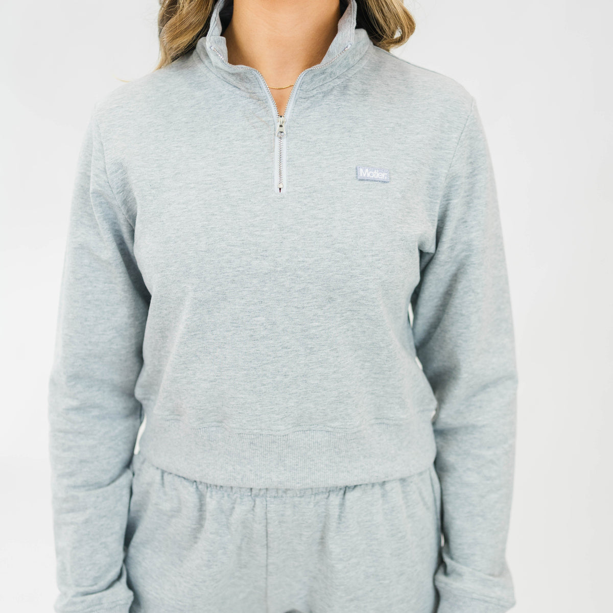 Grey Motier Lafayette The Refresh Quarter Zip II, lightweight men's quarter zip pullover, close-up of fabric and zipper detail.