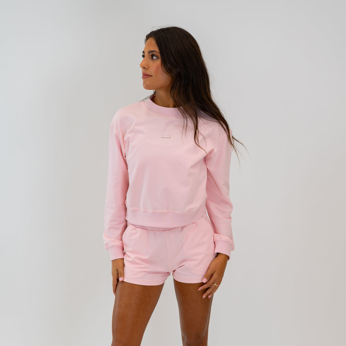 Motier Lafayette The Refresh Shorts in blush color, casual women's shorts with a relaxed fit, shown in a natural pose.