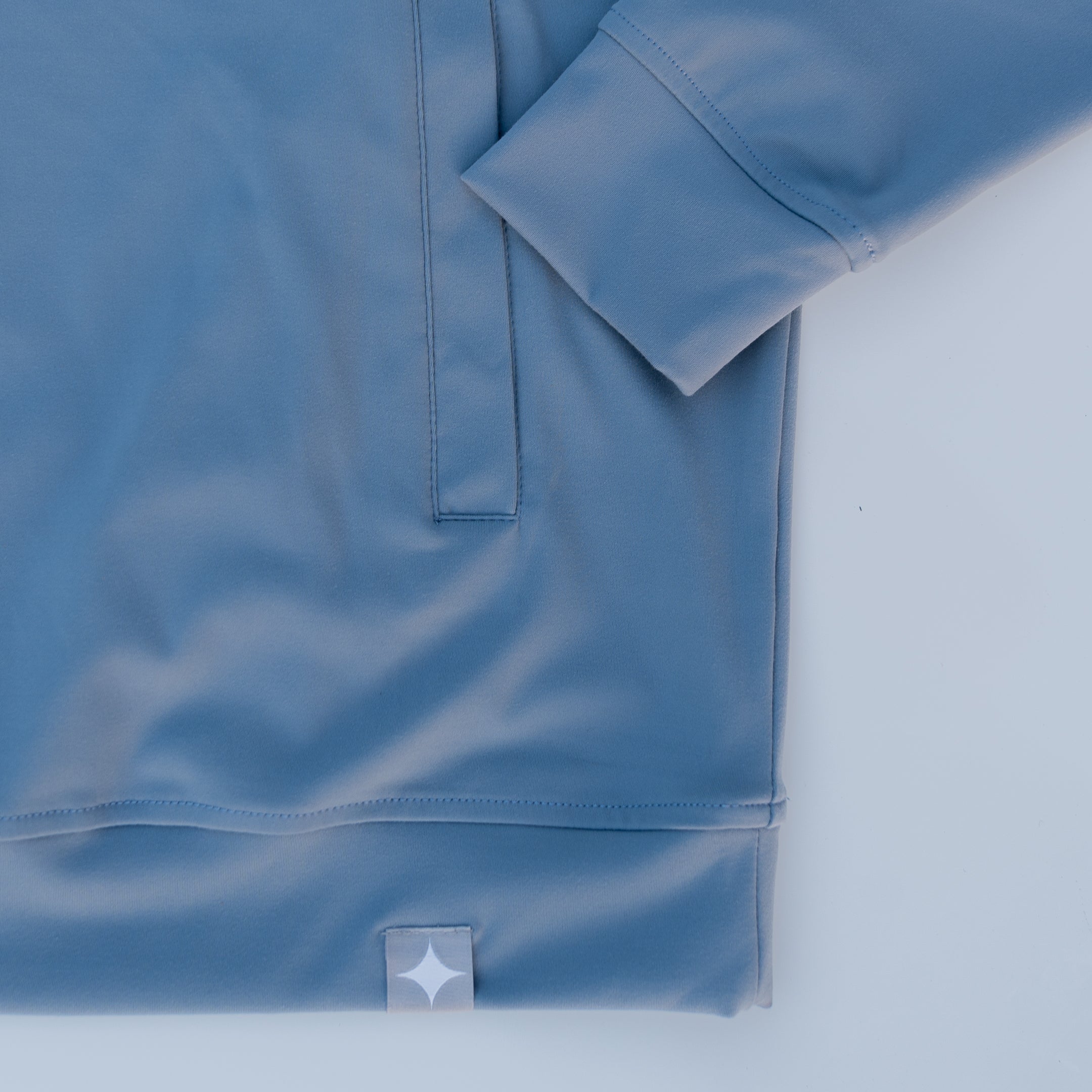 Motier Lafayette Riviera Lightweight Performance Hoodie II in slate blue, showing a comfortable, casual hoodie with a front pocket.