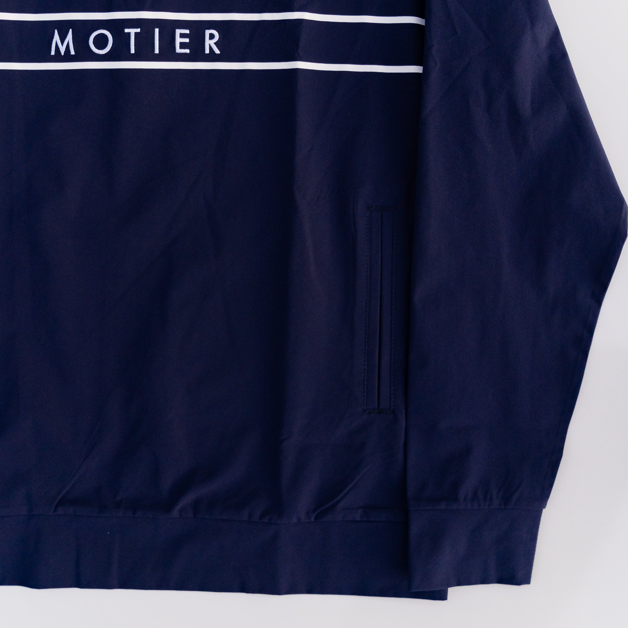 Navy Thomas Élite Pullover by Motier Lafayette showcasing a stylish, fitted sweater with a crew neckline and ribbed cuffs.
