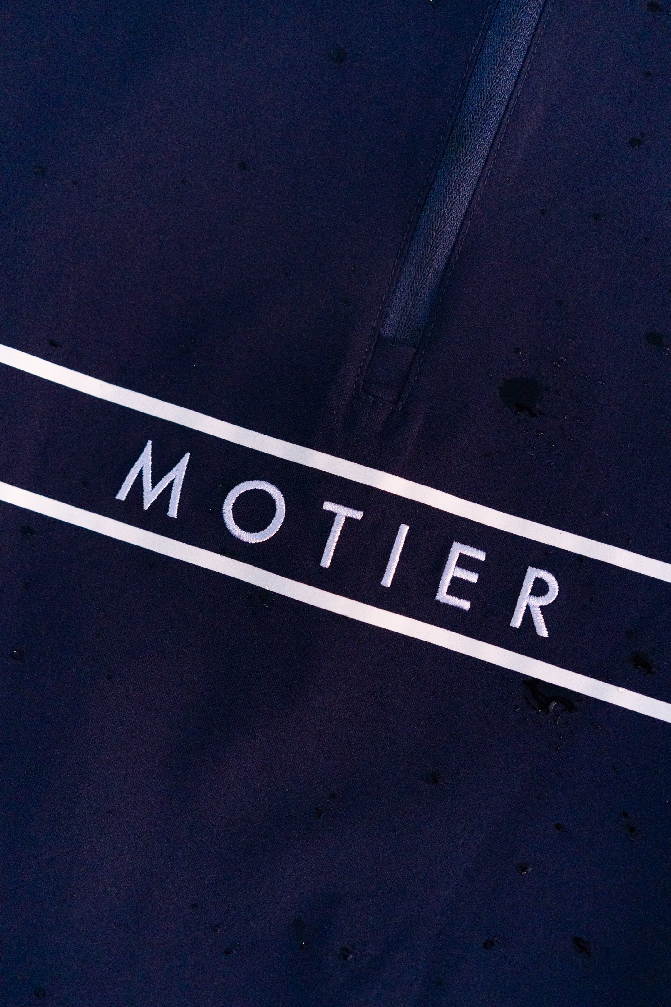 Navy Thomas Élite Pullover by Motier Lafayette, close-up of soft knit fabric and ribbed cuffs on a casual men's sweater