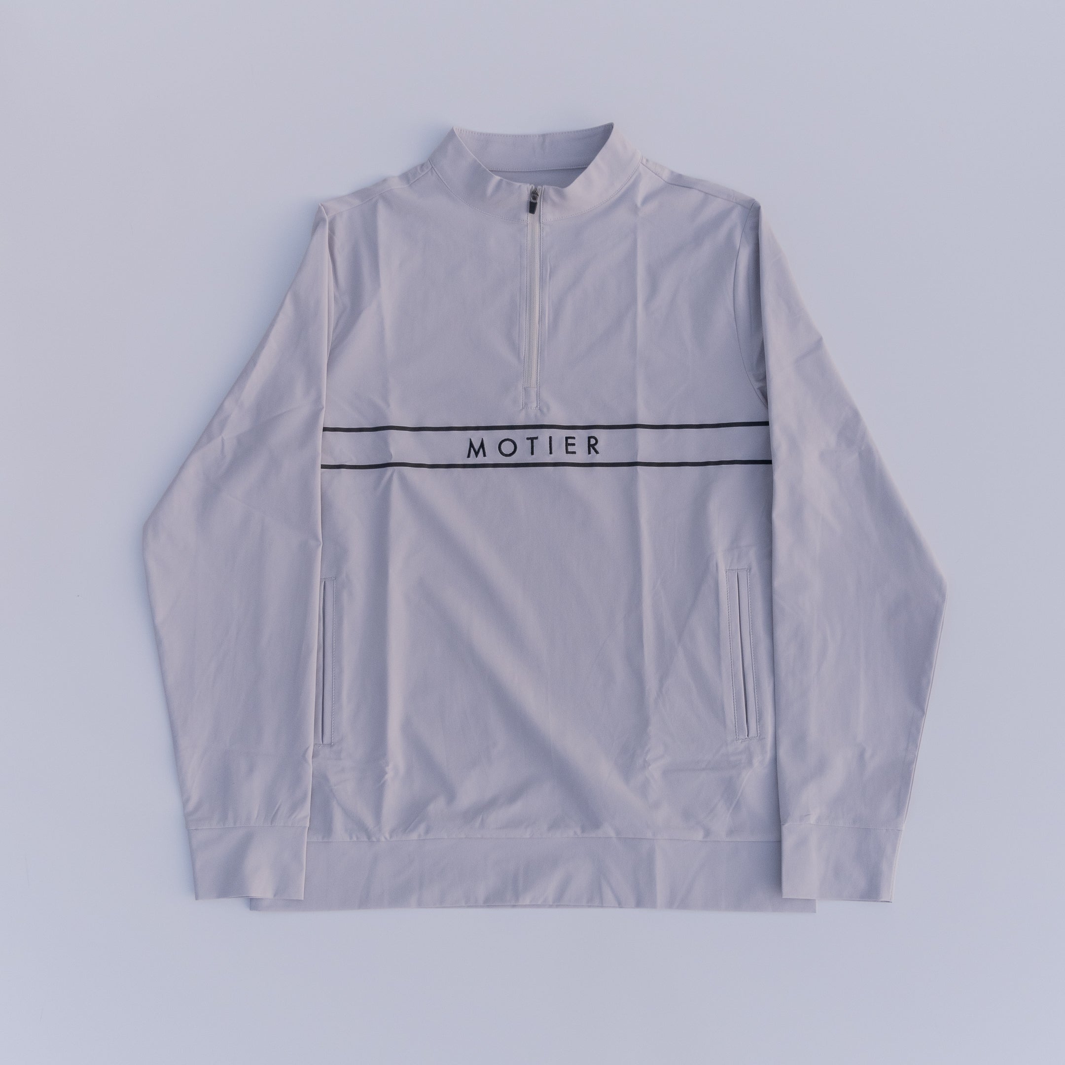Motier Lafayette Thomas Élite Pullover in smoke, close-up view showing soft fabric and stylish fit of the men's sweater.