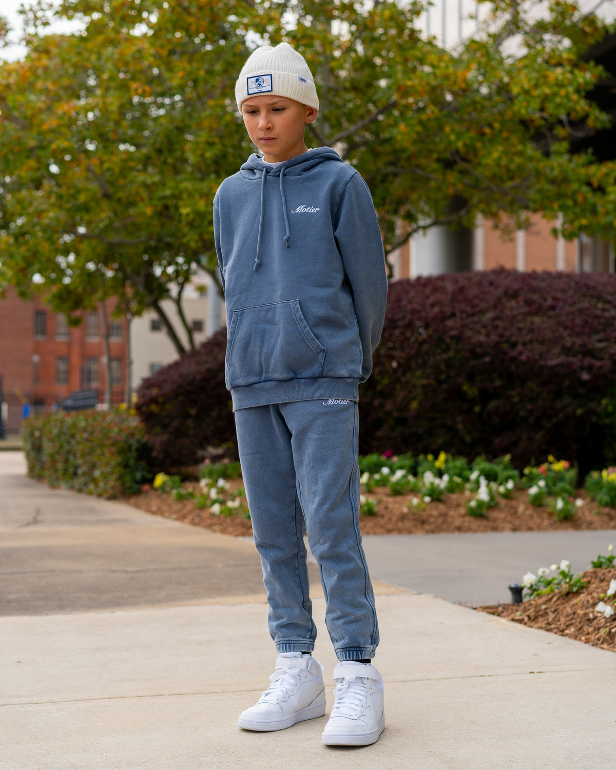 Motier Lafayette Youth Vital Signature Sweatpants in Infinity color, showing the comfortable fit and elastic waistband.
