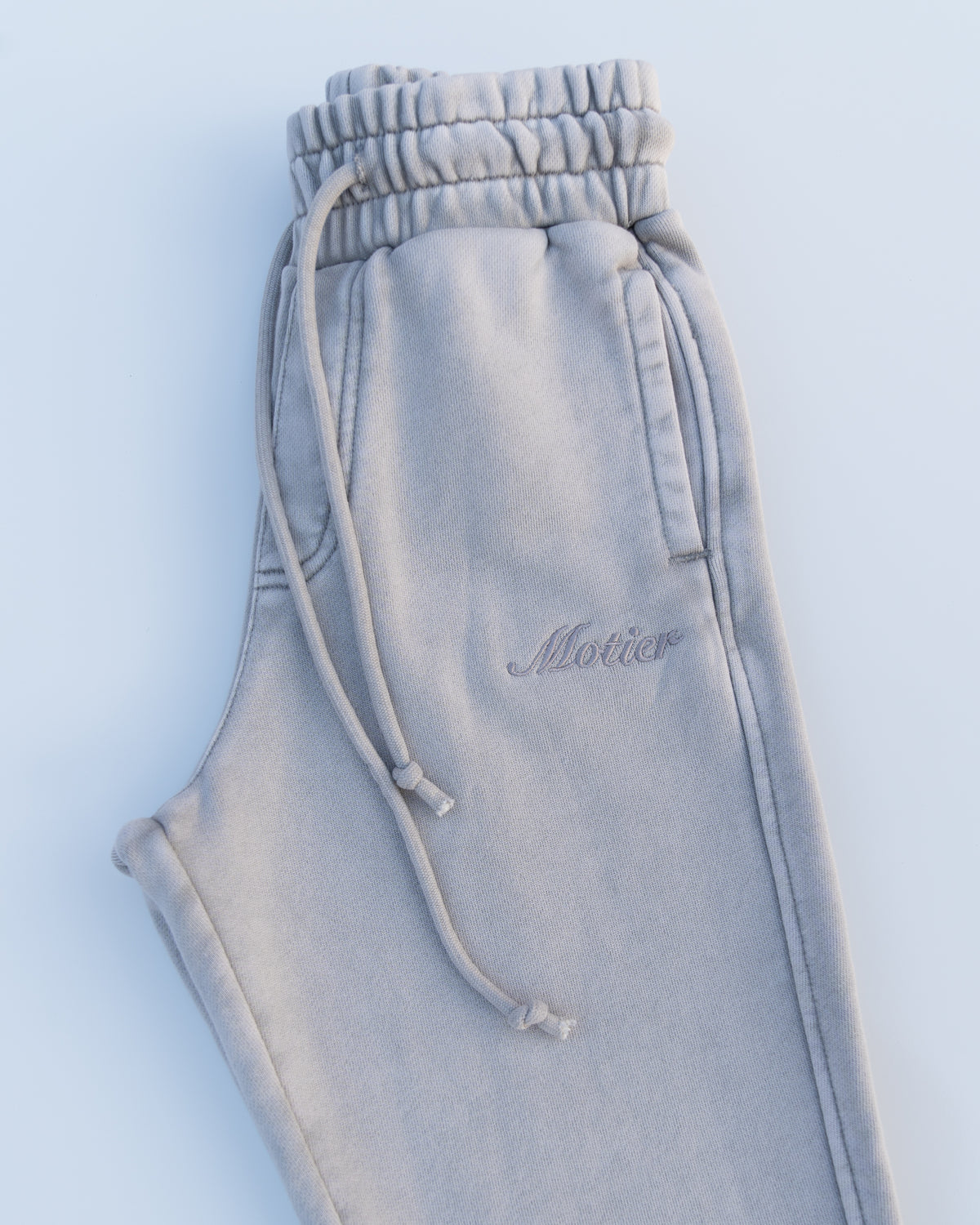 Motier Lafayette Youth Vital Signature Sweatpants in Paloma color, soft cotton with elastic waistband and relaxed fit.