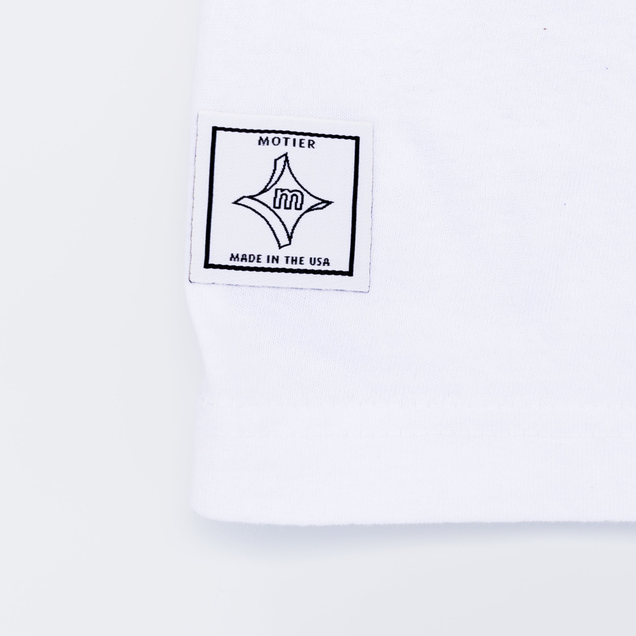 The Krewe De Motier 2025 Luxe Tee (White) - Motier Lafayette 